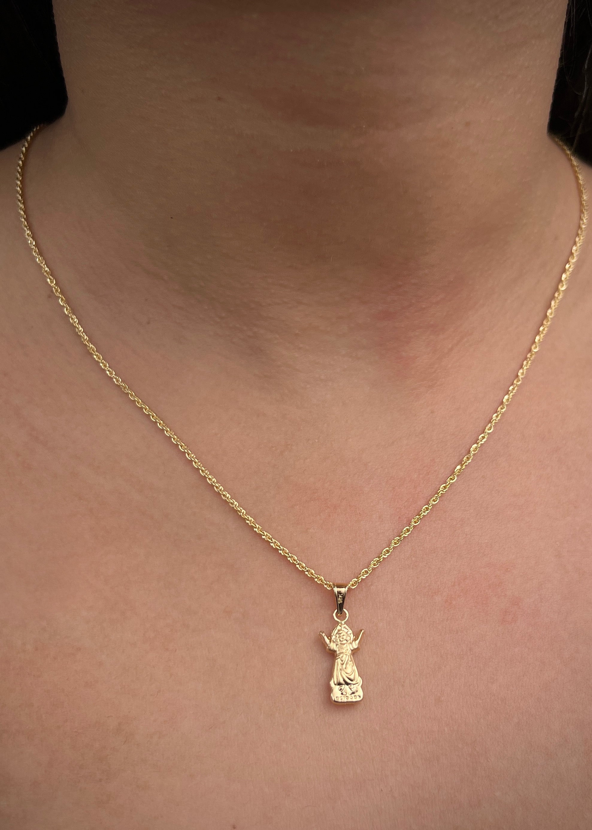 Dije del divino niño 0.5gr / Largo 2.1cm / Oro Amarillo Nac P