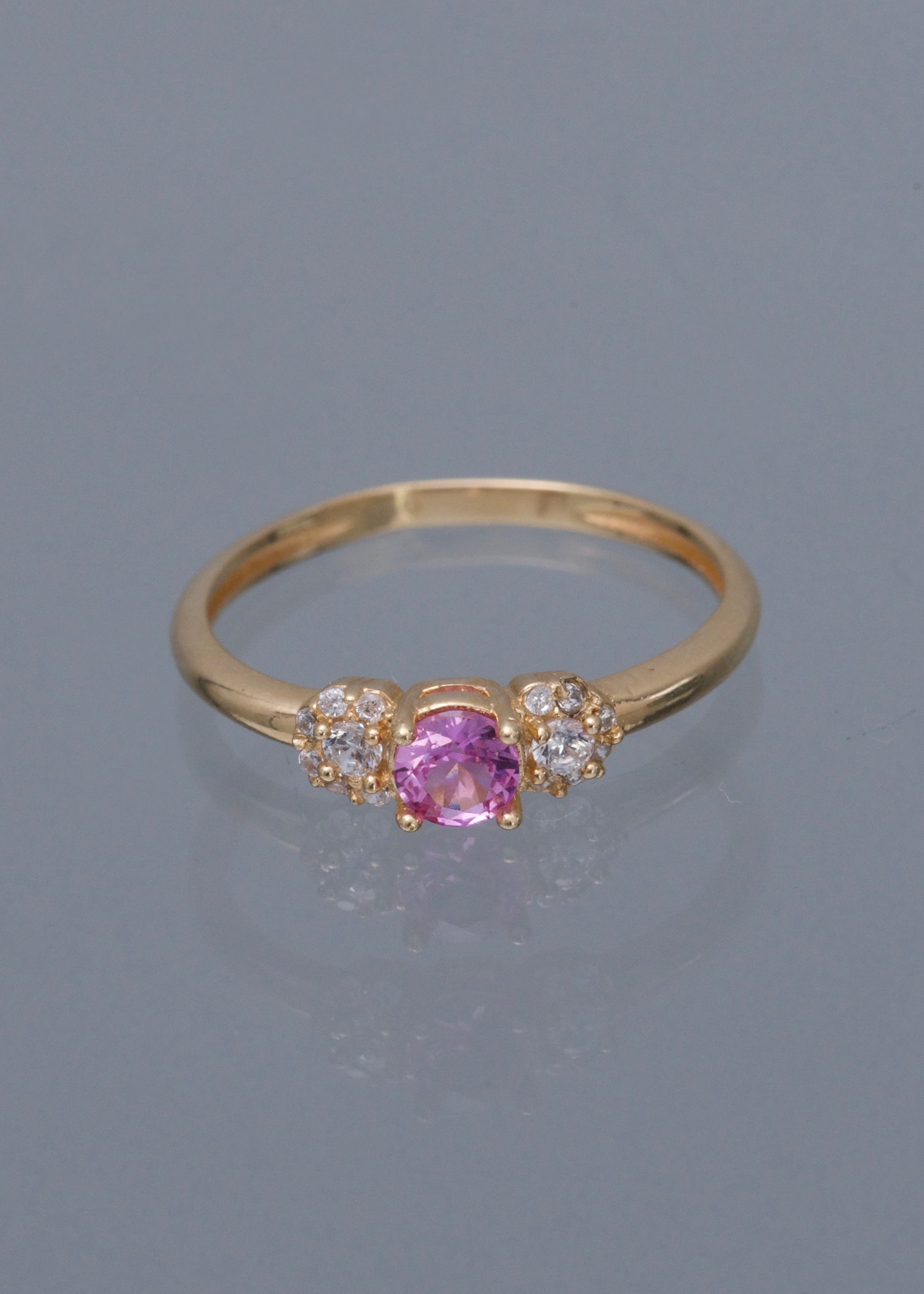 Solitario con swarovski rosado y blanco 1.7gr / Talla 6 1/4 / Oro Amarillo Nac B