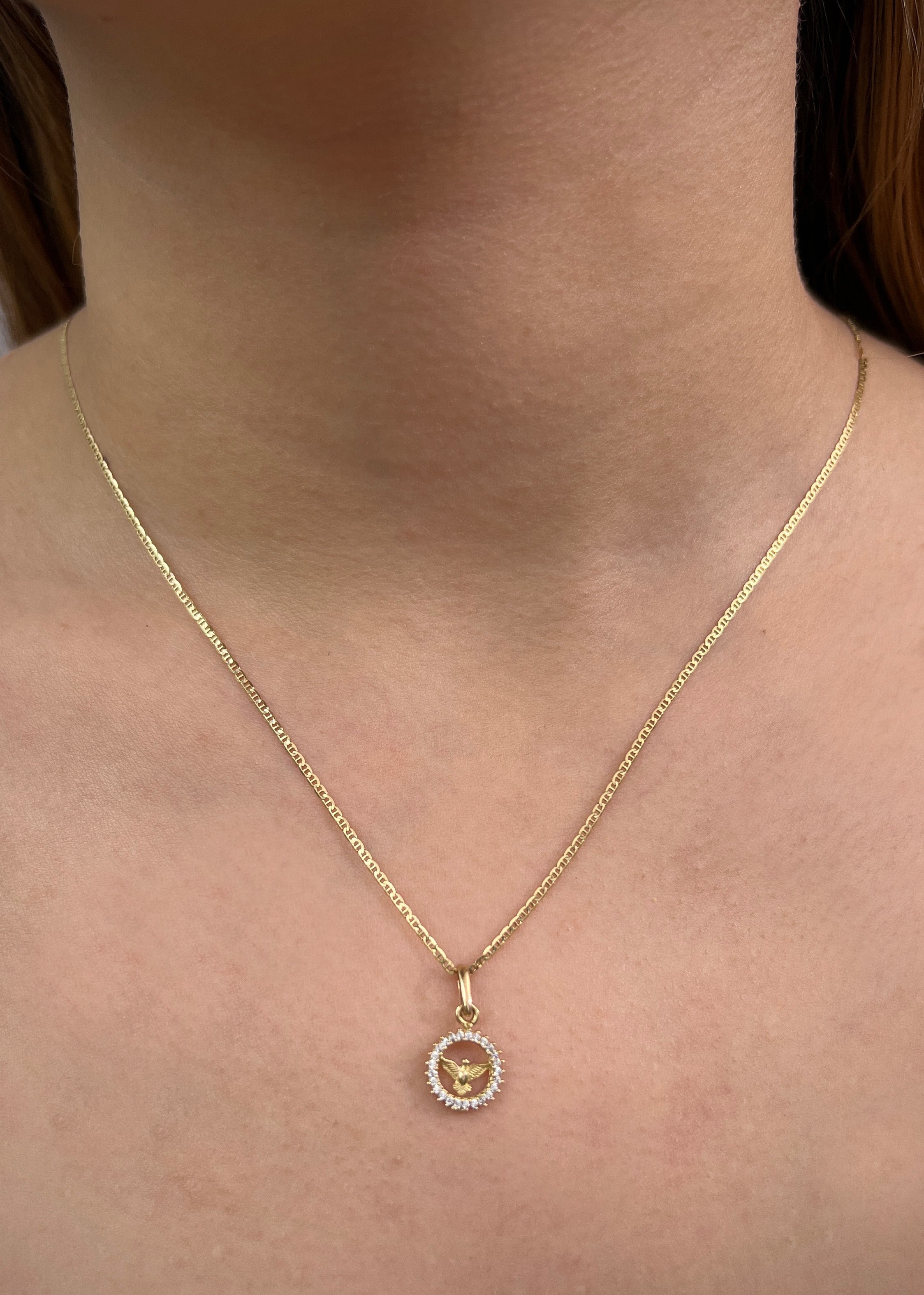 Dije espiritu santo con swarovski blanco 0.9gr / Largo 1.8cm / Oro Amarillo Nac P