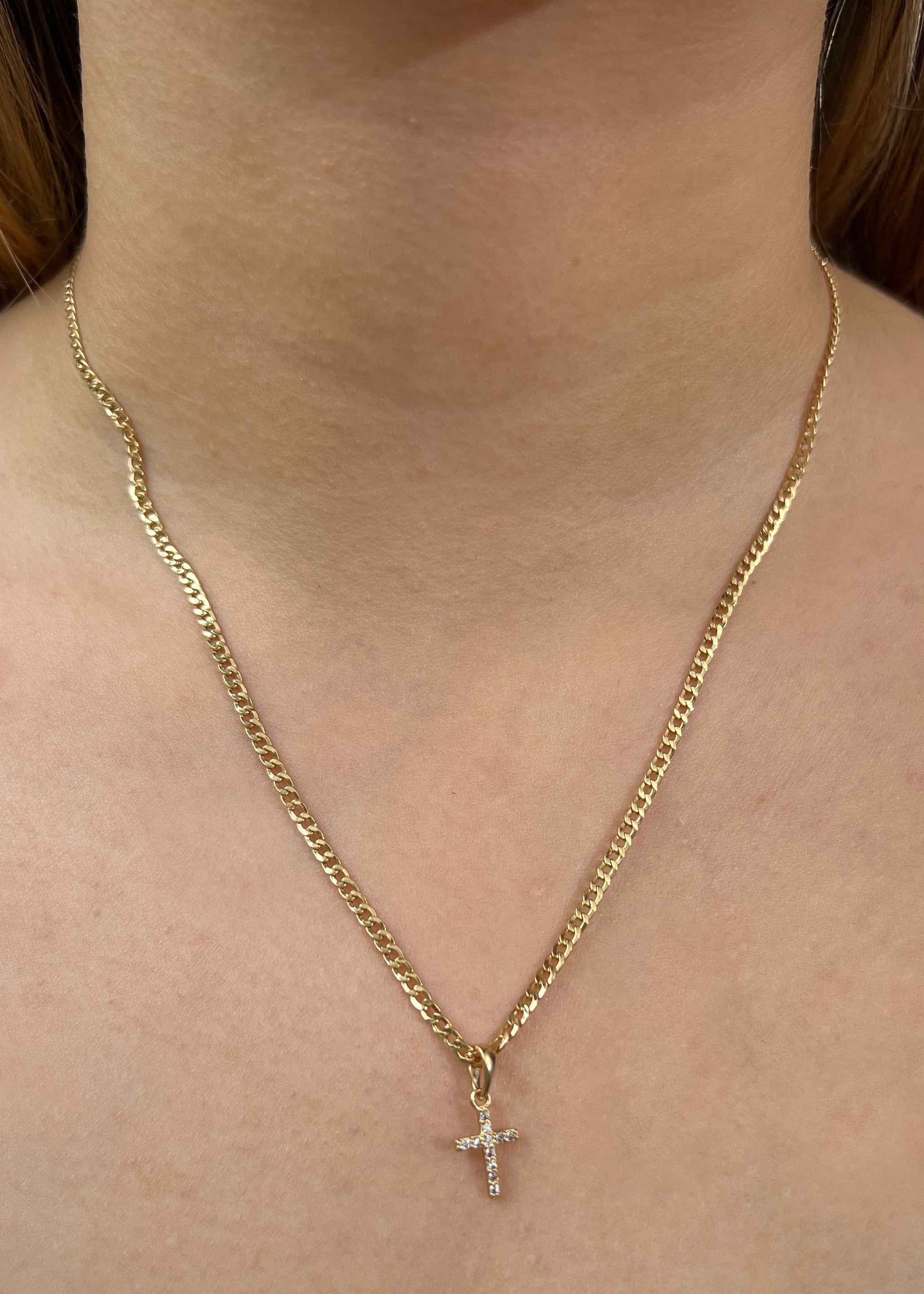 Dije cruz con swarovski blanco 0.55gr / Largo 1.7cm / Oro Amarillo Nac M