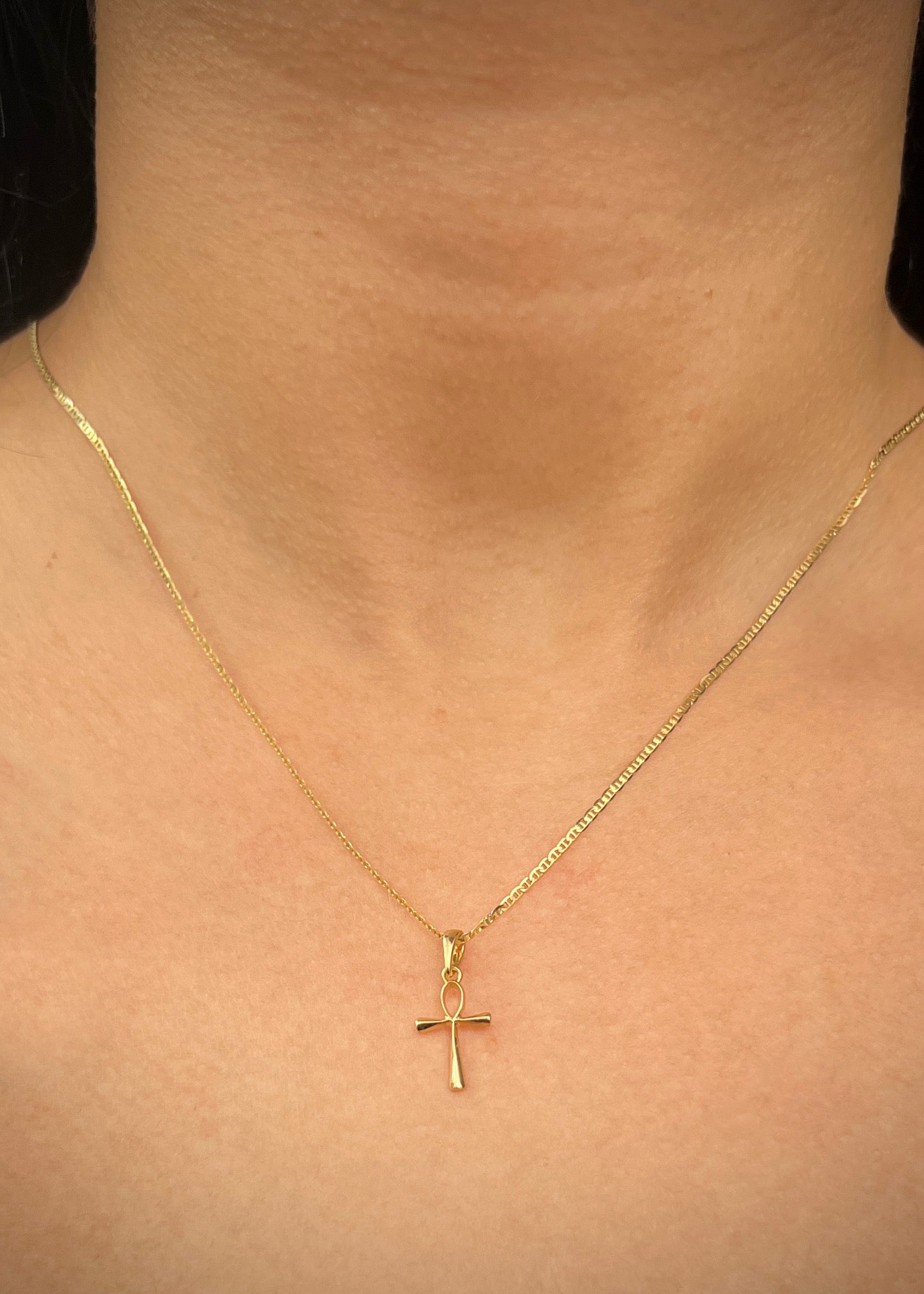 Dije cruz egipcia 0.6gr / Largo 2cm / Oro Amarillo Nac M