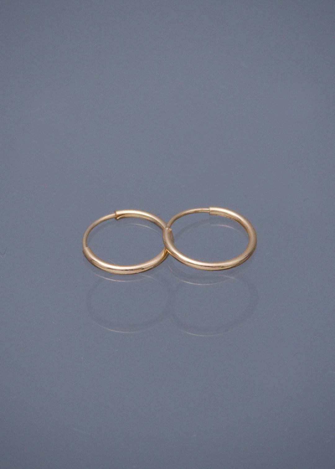 Candongas Lisas 0.4gr / 1cm / 1.1mm — Oro Amarillo