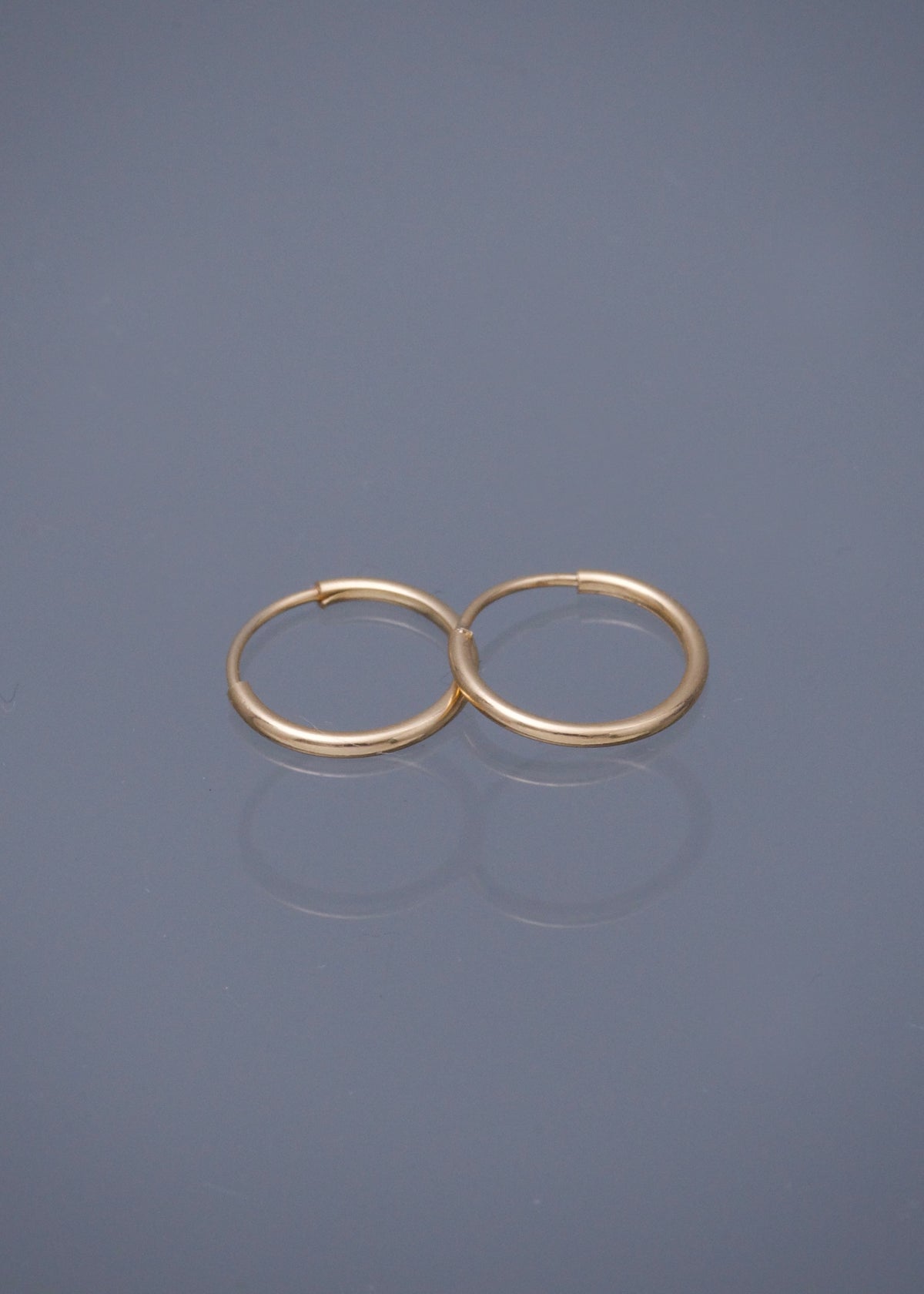 Candongas Lisas 0.45gr / 1cm / 1.2mm — Oro Amarillo