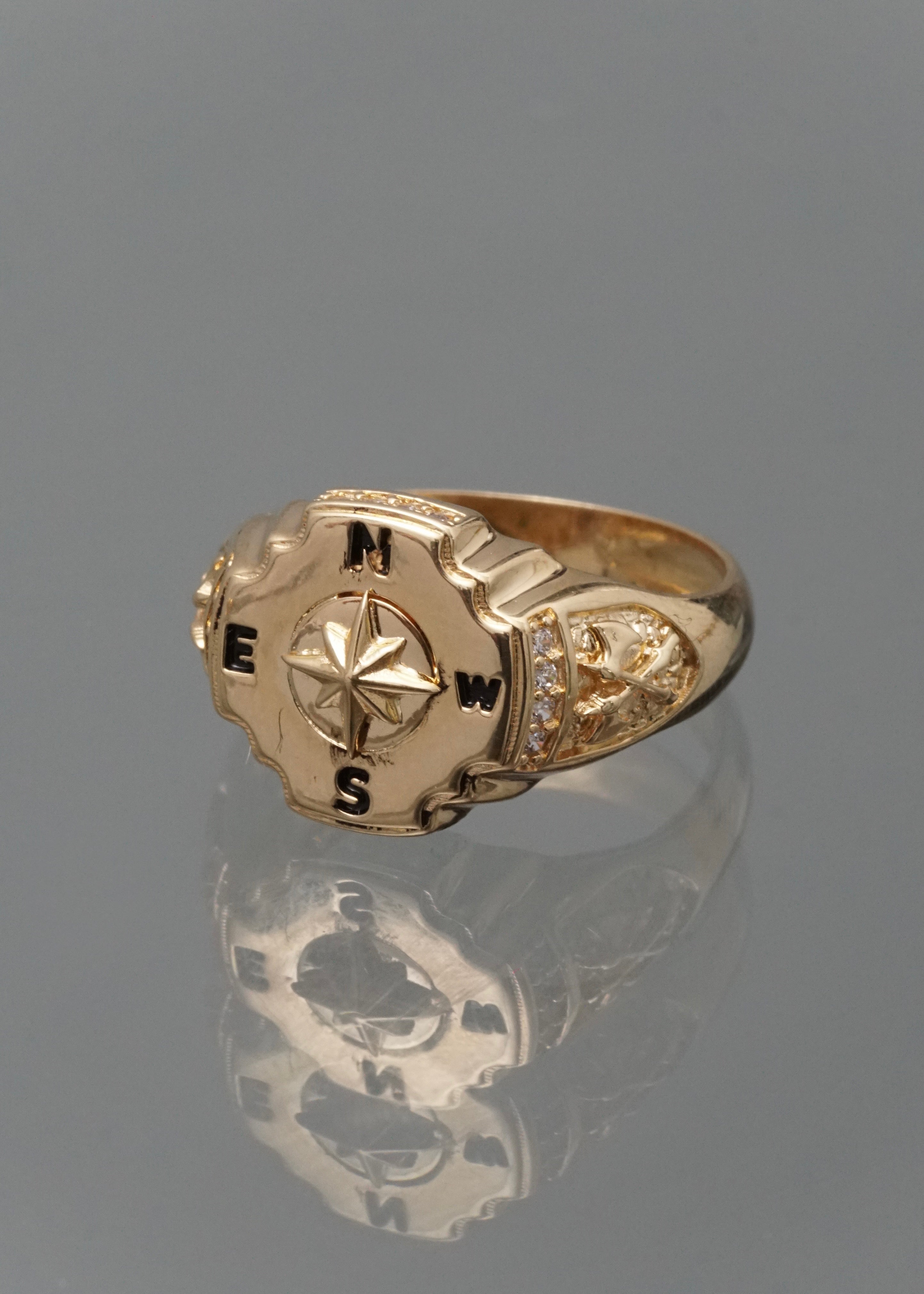 Anillo brujula con swarovski blanco 6.85gr / Talla 9 3/4 / Oro Amarillo Nac B