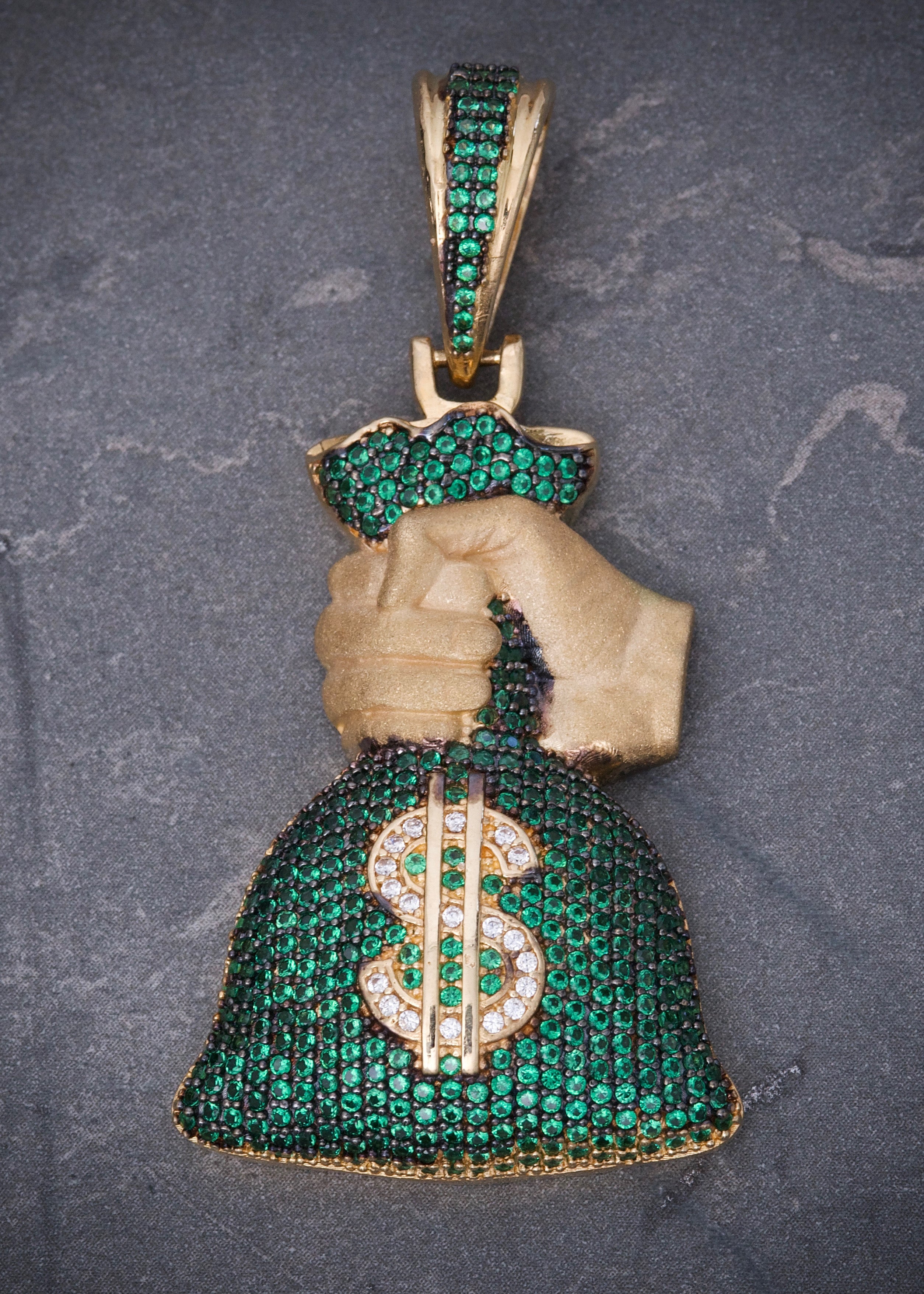 Dije bolsa de dinero con swarovski verde 15.75gr / Largo 5.5cm / Oro Amarillo Nac M