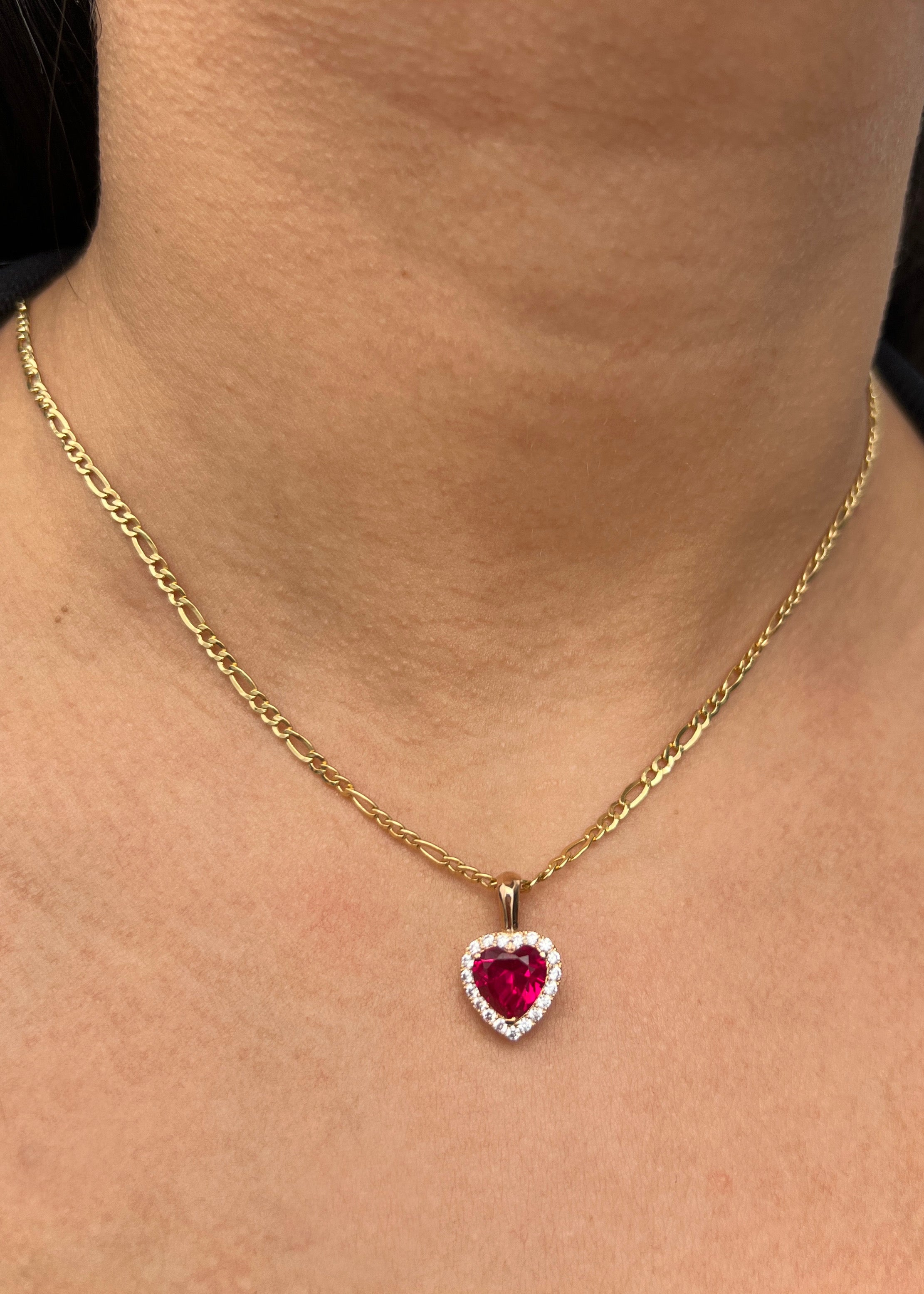 Dije corazon con swarovski fucsia y blanco 2.7gr / Largo: 1.8cm / Oro Rosado Nac M