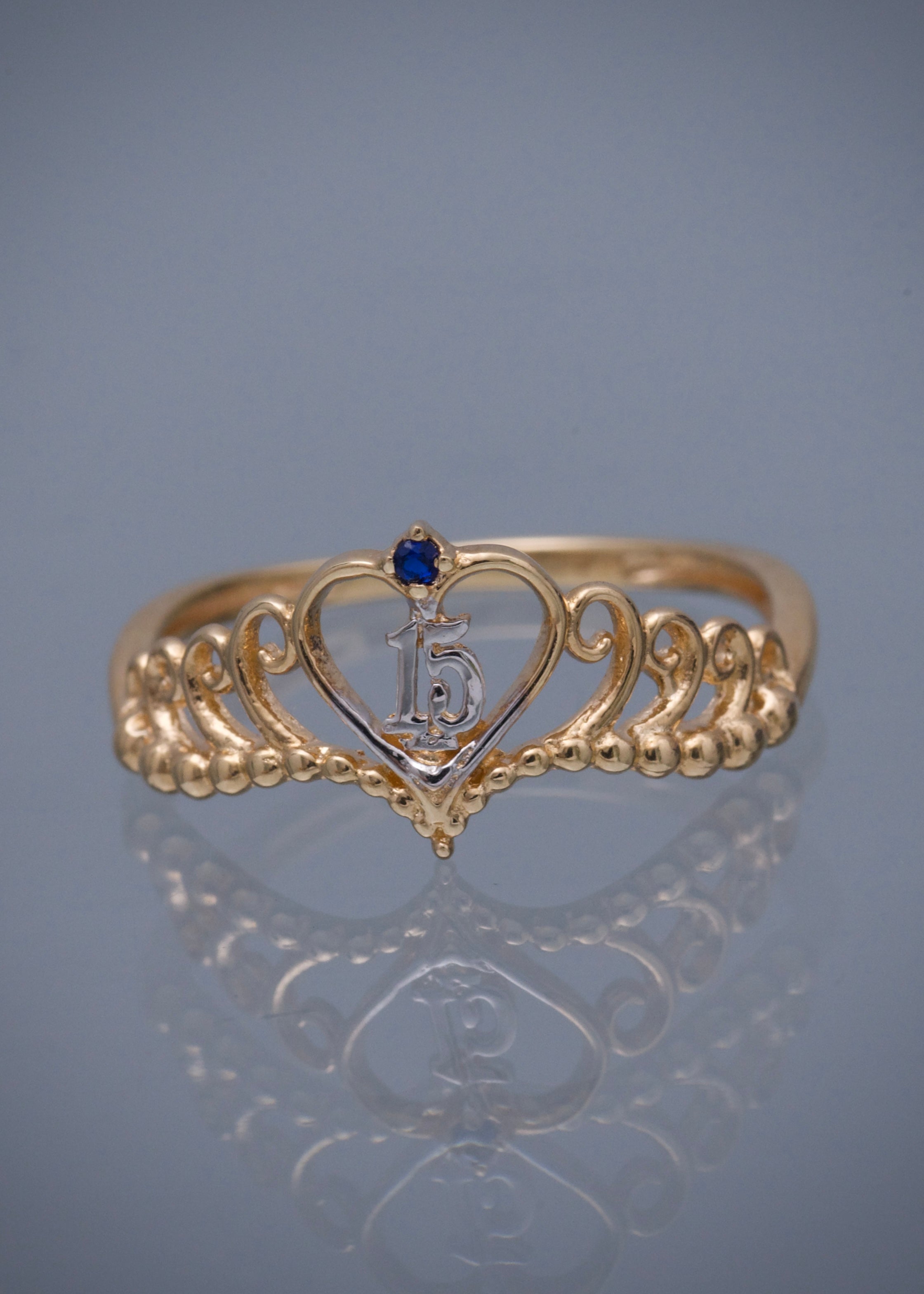 Anillo corona de 15s con swarovski azul 1.85gr / TALLA 7 / Oro Amarillo Nac M