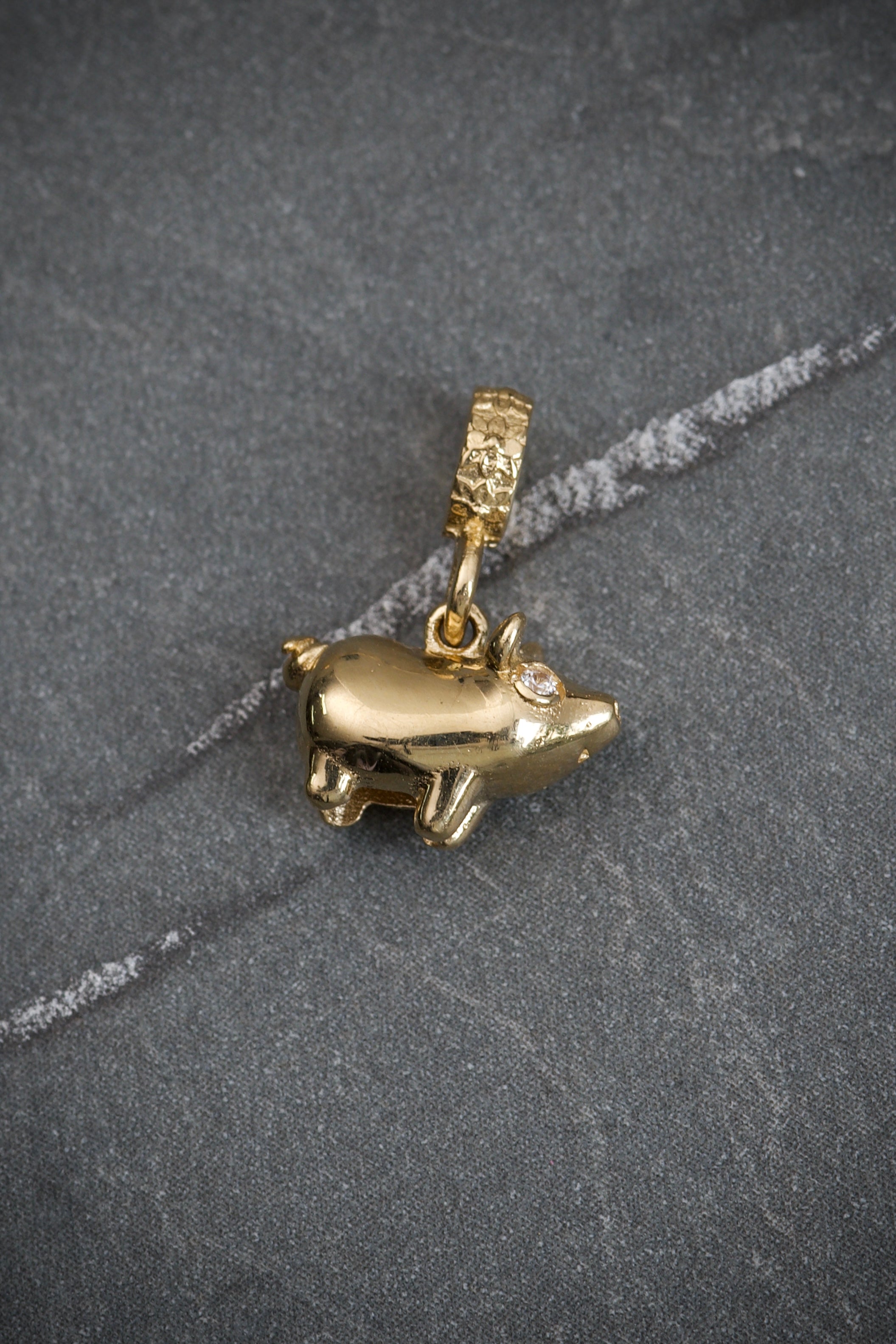 Dije mini pig 2.1gr / 1.2cm / Oro Amarillo Nac B