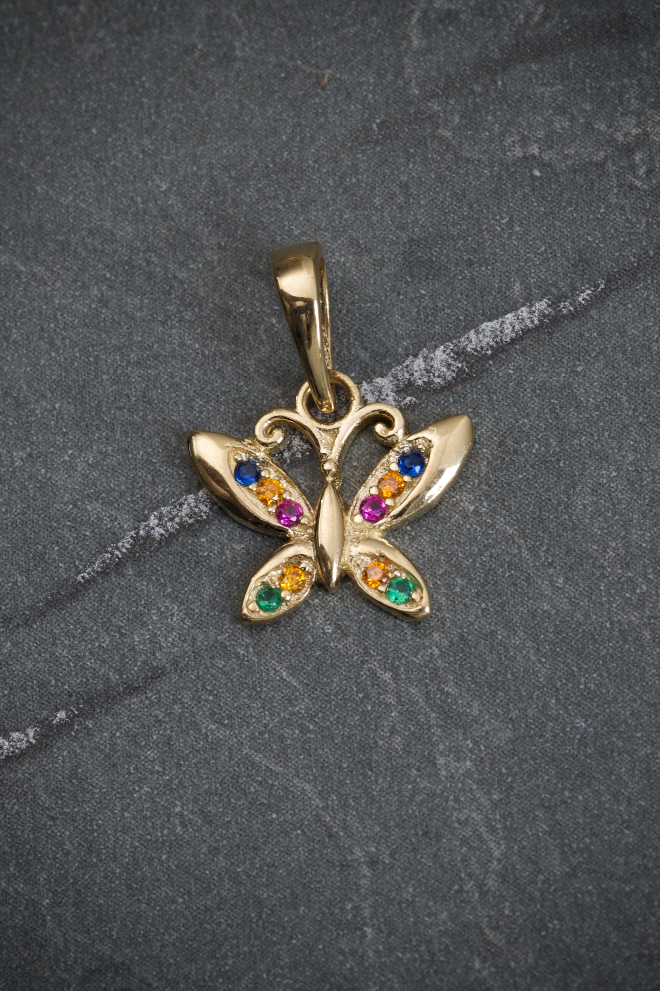 Dije de mariposa con swarovski multicolor 1gr / 1.5cm / Oro Amarillo Nac B