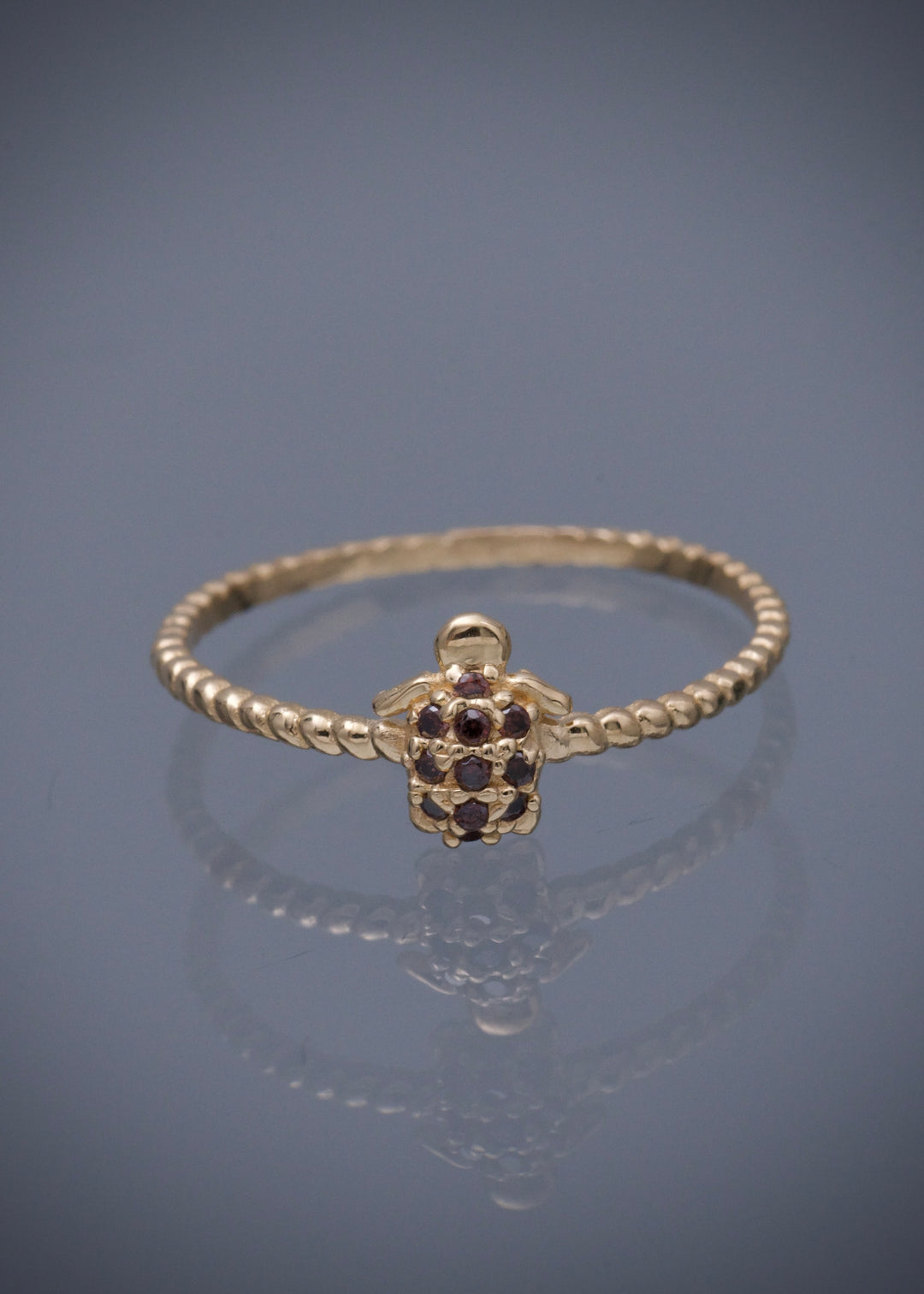 Anillo tortuga con swarovski cafe 1.2gr / Talla 7 — Oro Amarillo