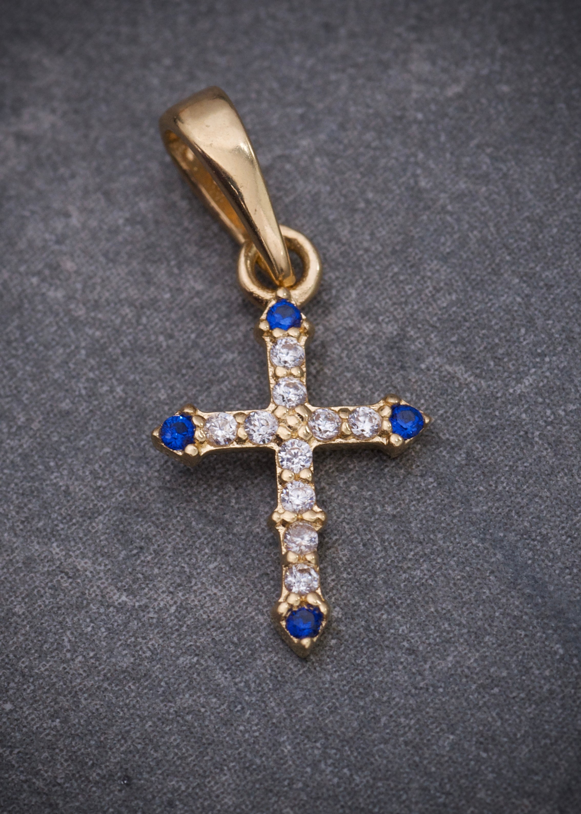 Dije cruz con swarovski azul y blanco 0.5gr / Largo 1.8cm / Oro Amarillo Nac P