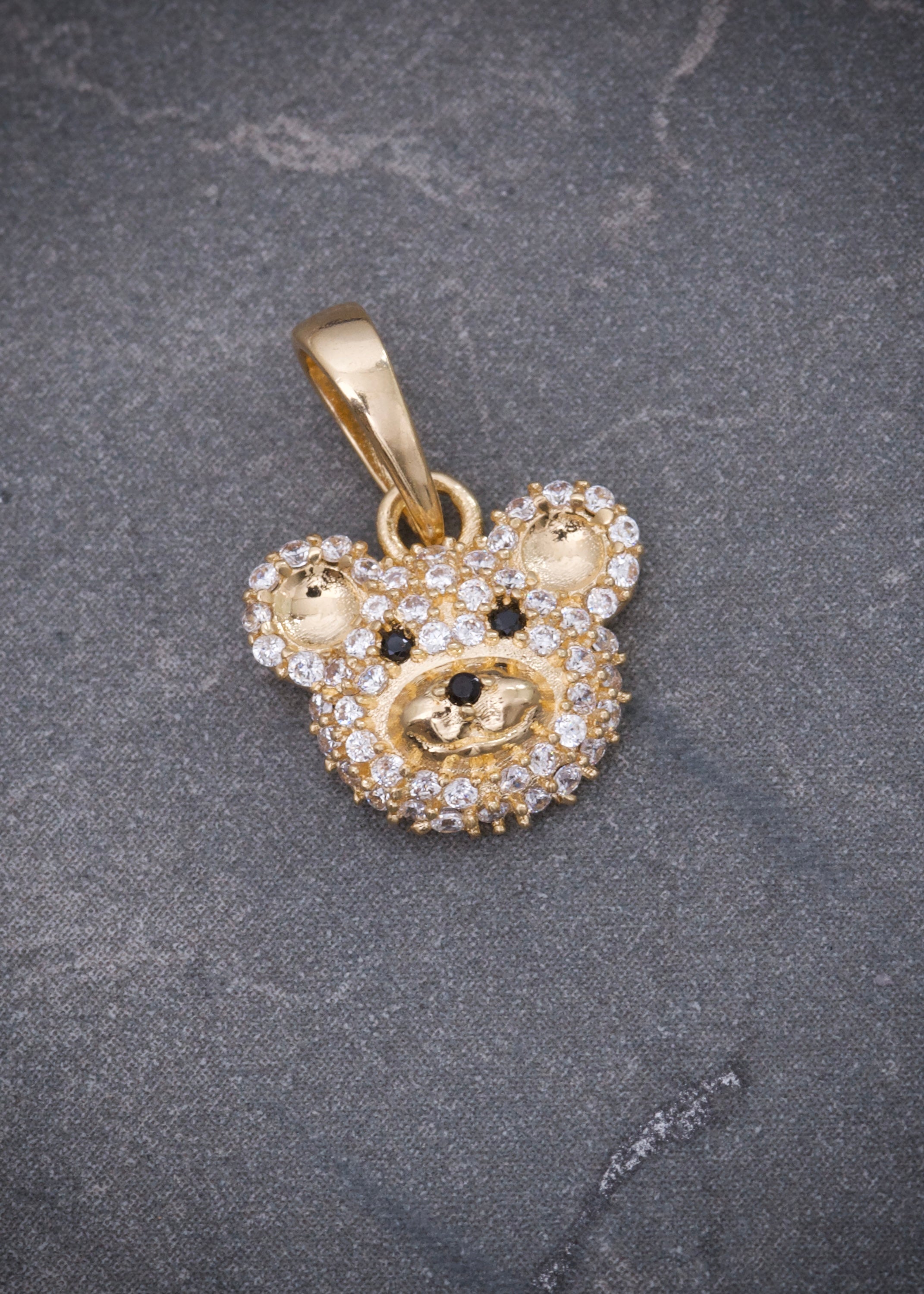 Dije oso con swarovski blanco 1.35gr / Largo 1.6cm / Oro Amarillo Nac*