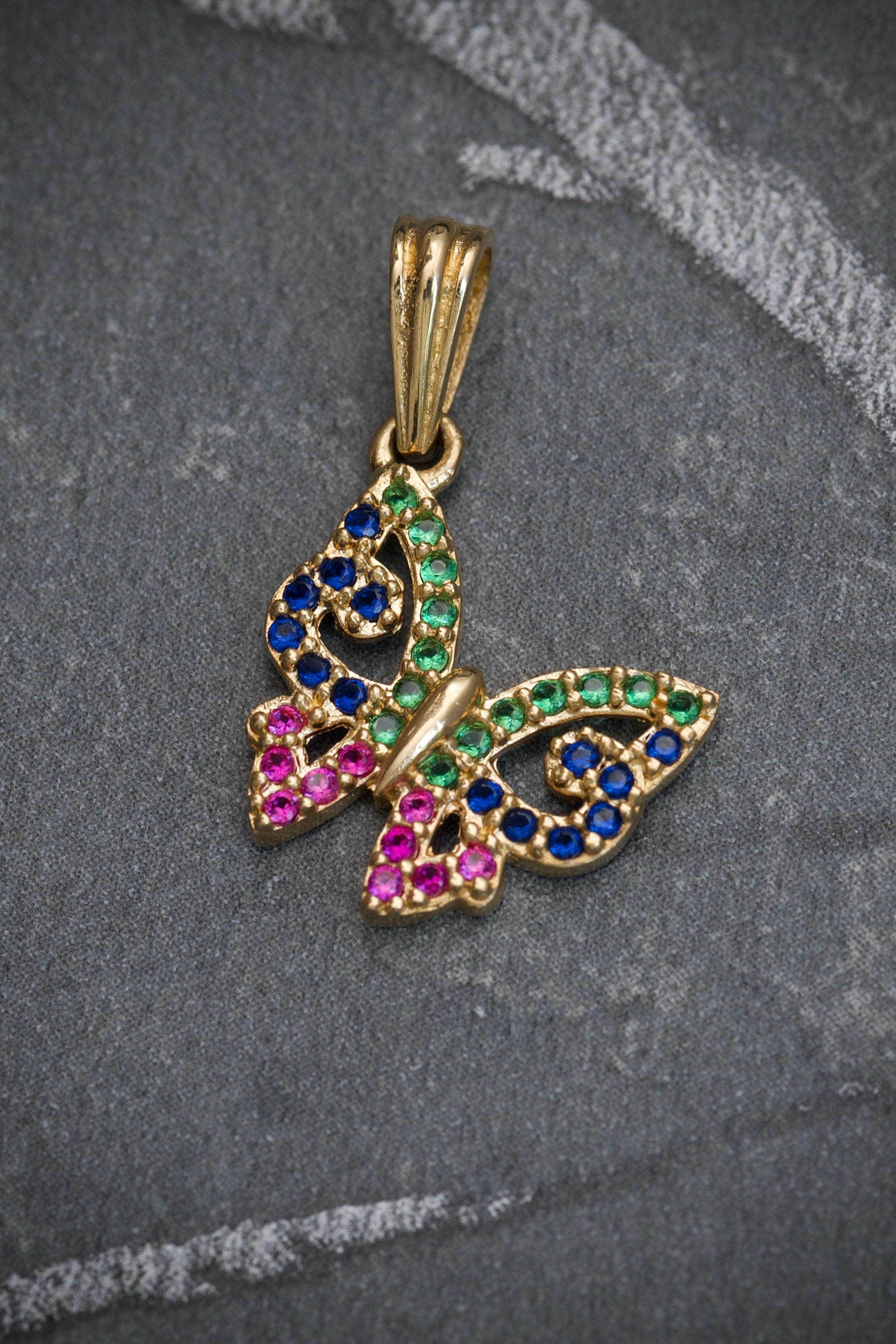 Dije de mariposa con swarovski multicolor 1.35gr / 2cm / Oro Amarillo Nac M