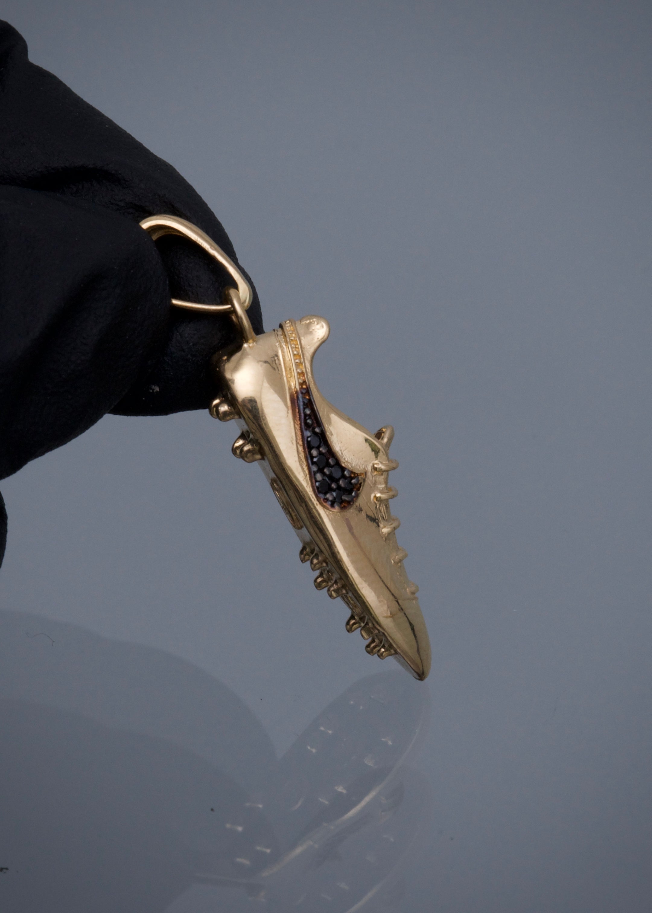 Dije guayo con swarovski negro 3.5gr / Largo 3.2cm / Oro Amarillo Nac P