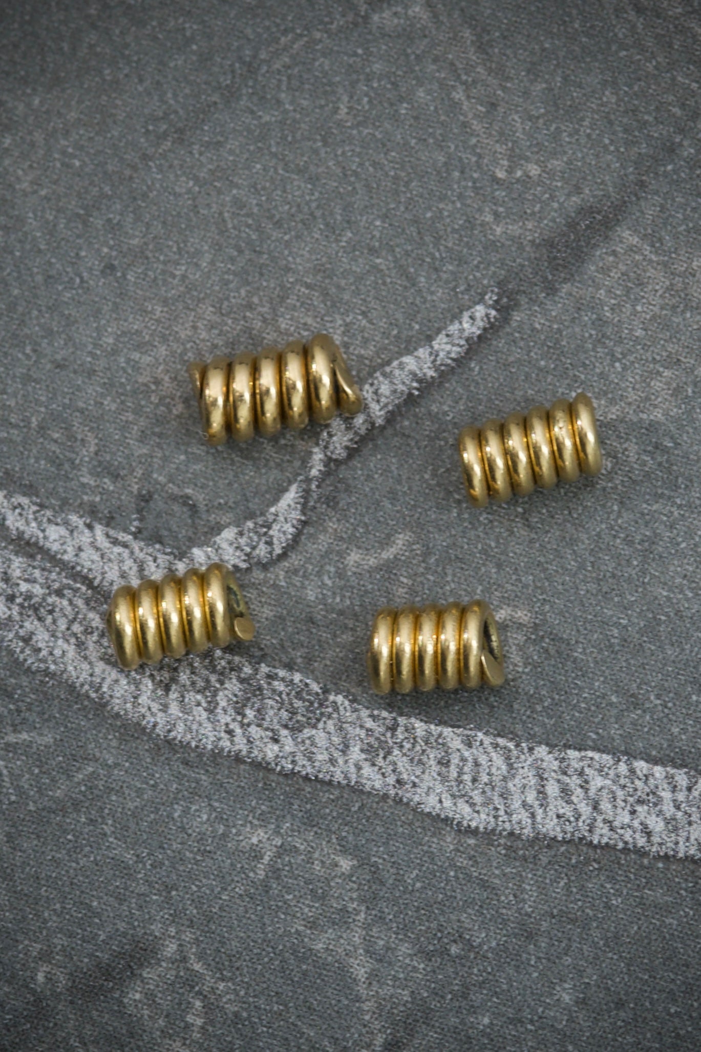 Herraje de resorte 0.2gr / Oro Amarillo Nac B