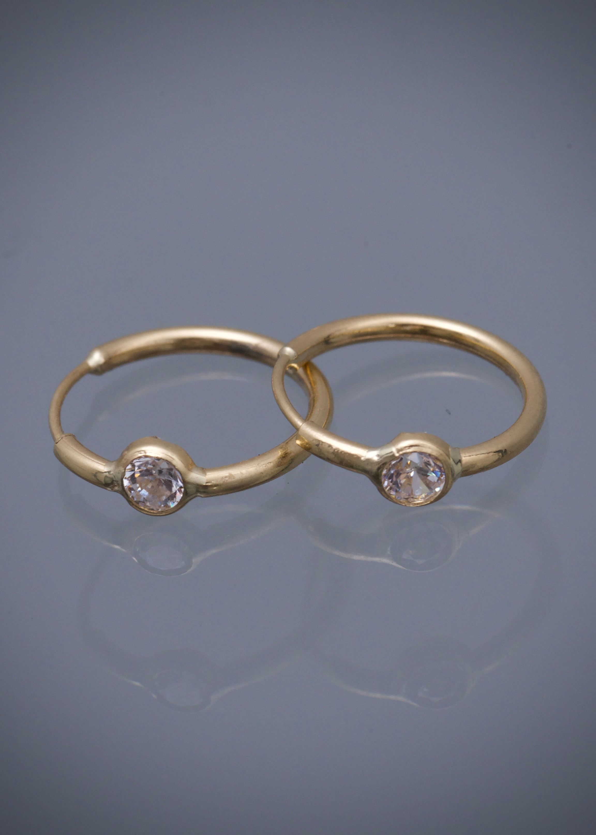 Candongas con swarovski blanco 0.6gr / Largo 1.1cm — Oro Amarillo