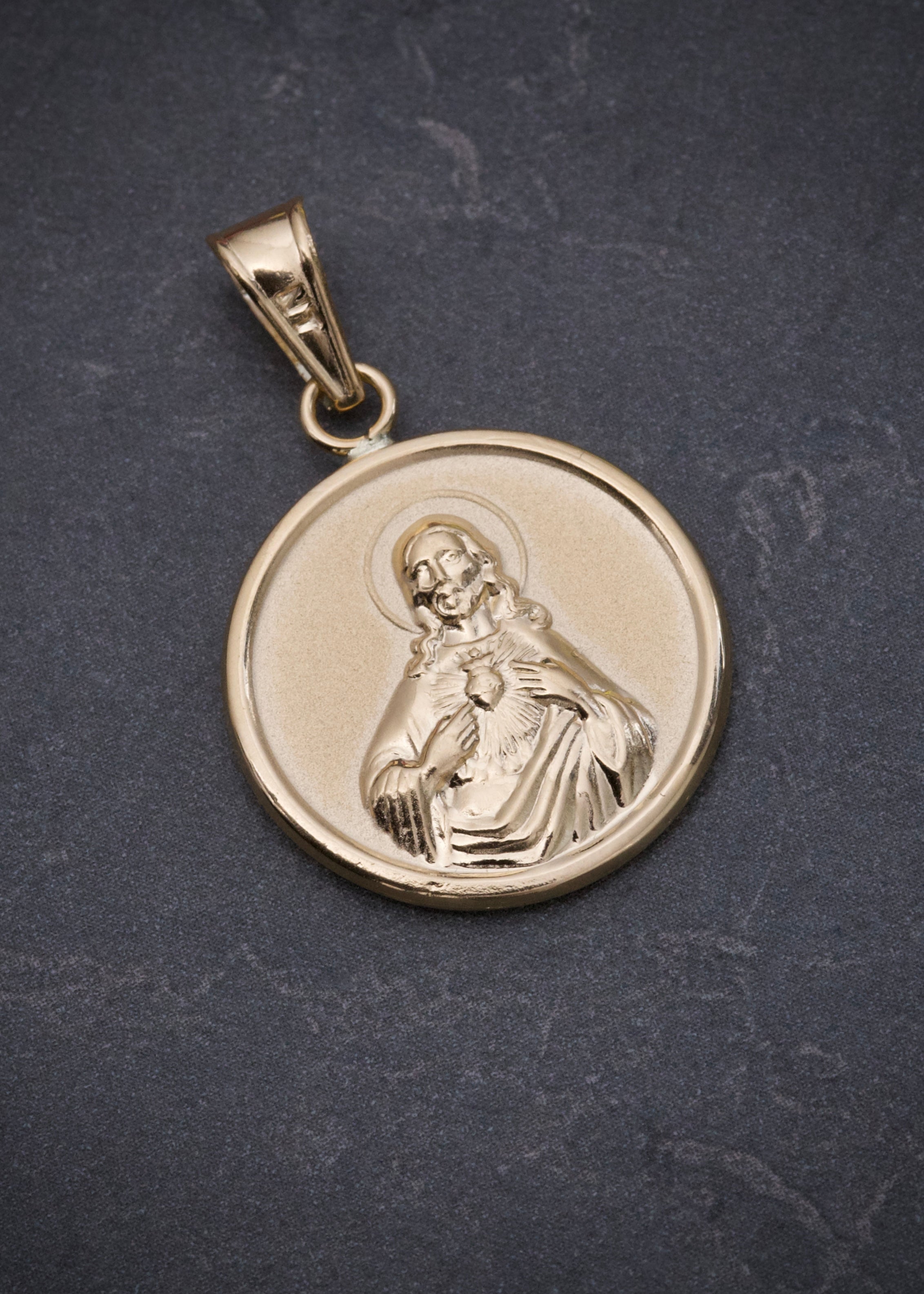 Dije corazon de jesus y virgen del carmen 2.2gr / Largo 3cm / Oro Amarillo Nac B