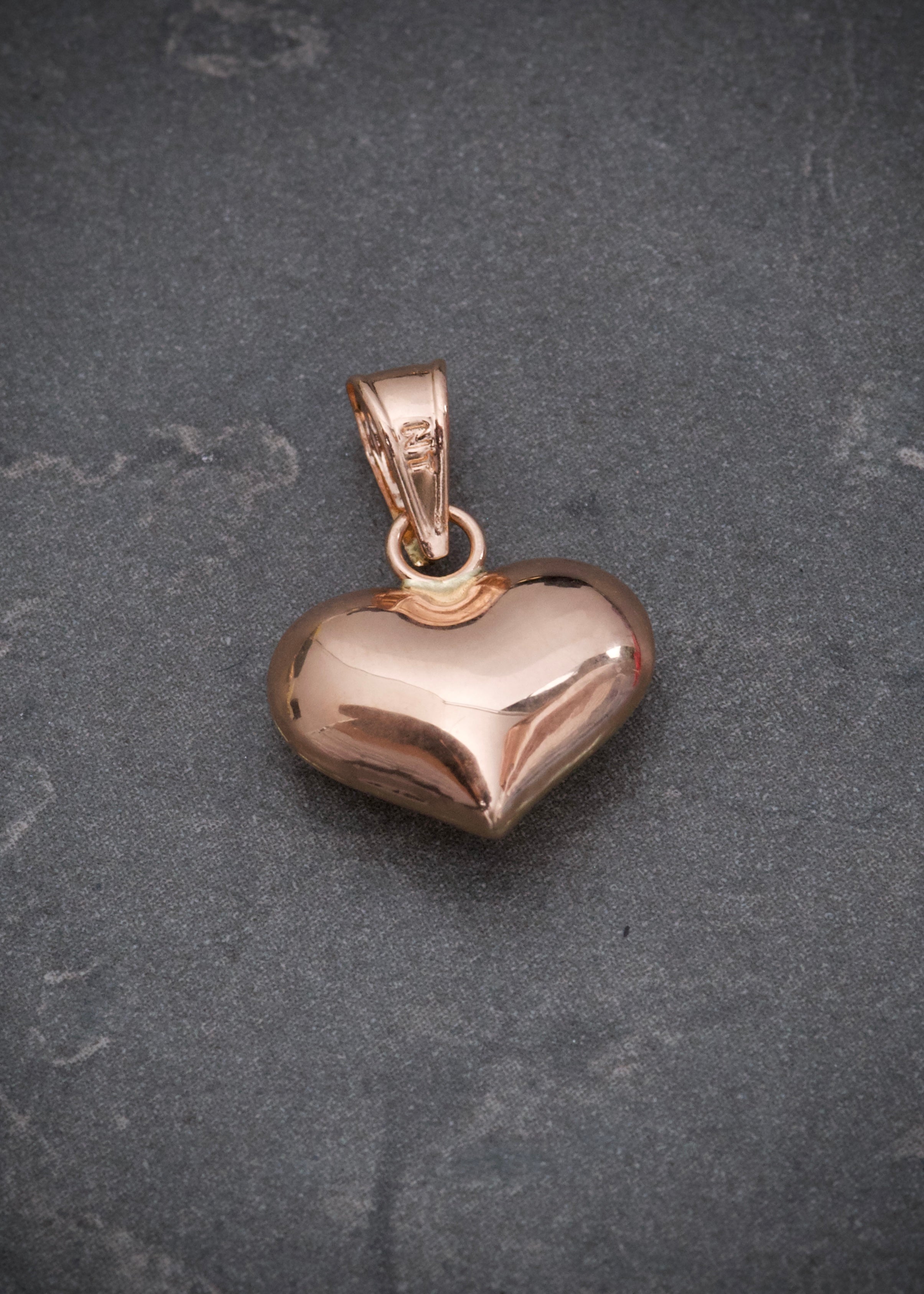 Dije corazon liso 0.75gr / Largo 1.9cm / Oro Rosado Nac M