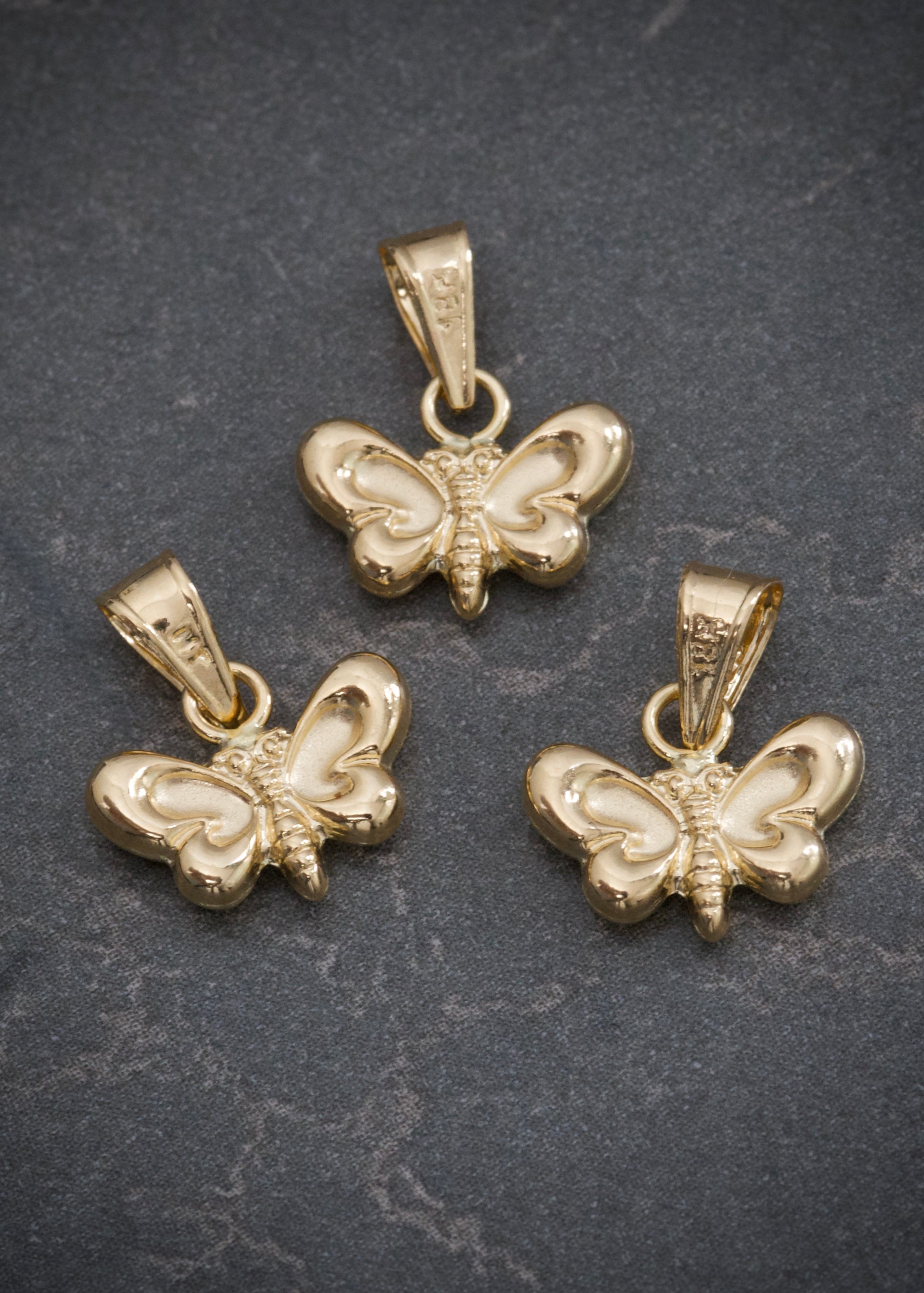 Dije mariposa 0.4gr / Largo 1.3cm / Oro Amarillo Nac M