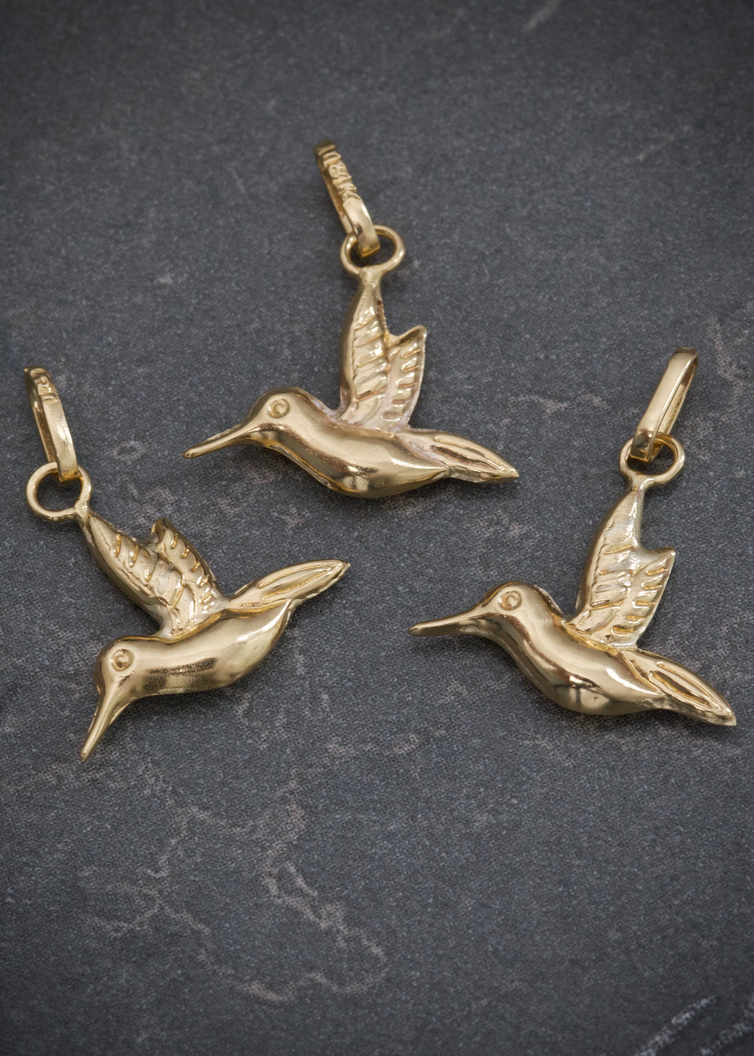 Dije colibri 0.4gr / Largo 1.8cm / Oro Amarillo Nac B