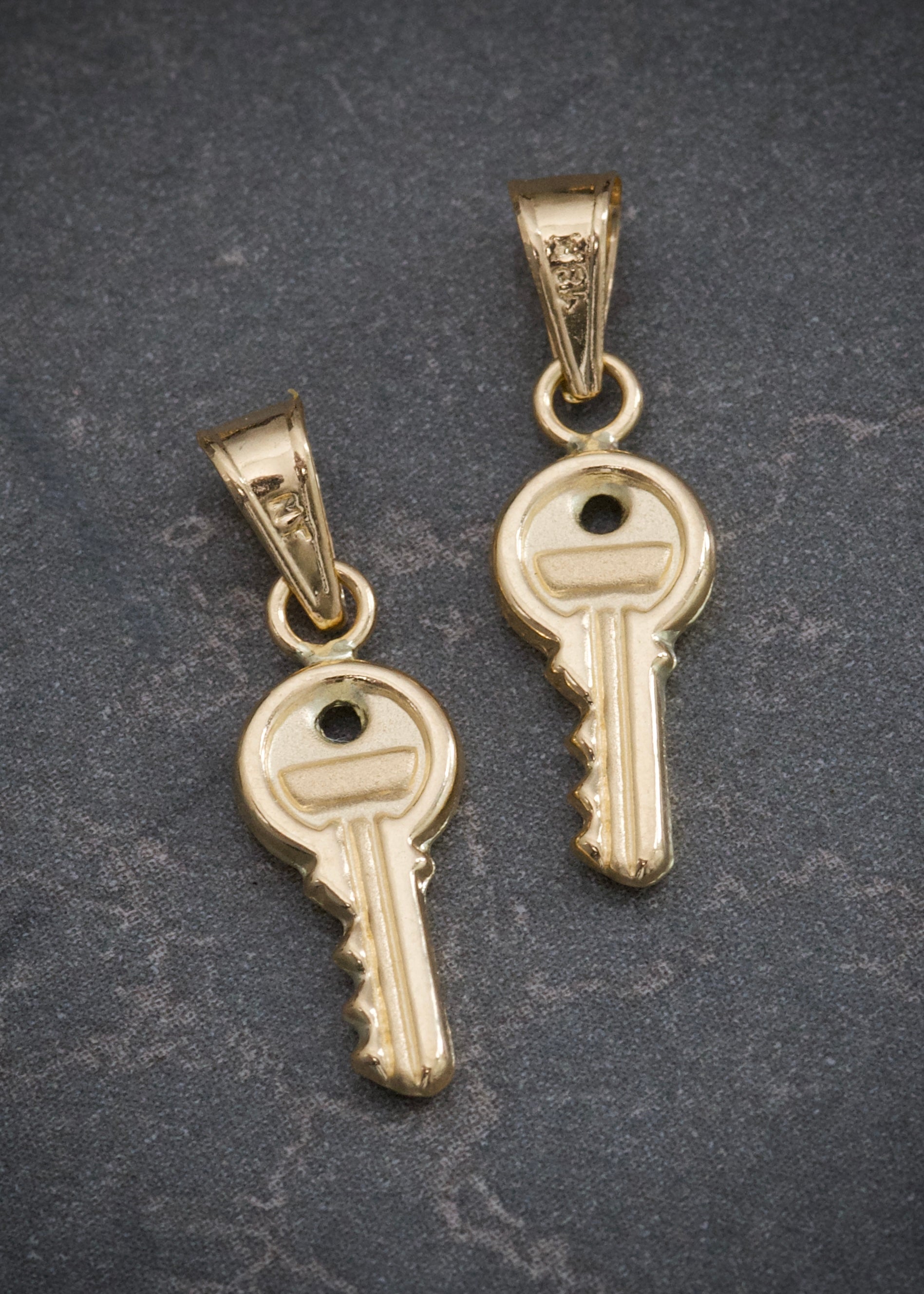 Dije llave 0.45gr / Largo 2cm / Oro Amarillo Nac M