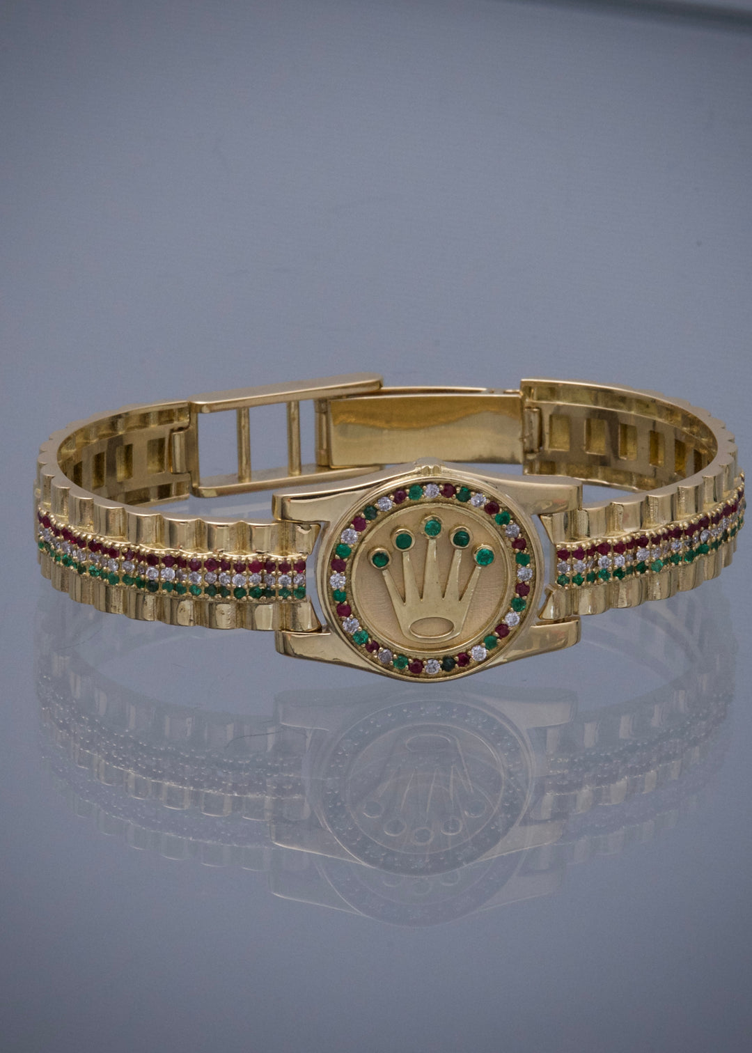 Pulso rx con 211pts de esmeraldas / diamantes / rubies 57.8gr / Largo 18.5cm / Oro Amarillo (Joya) M
