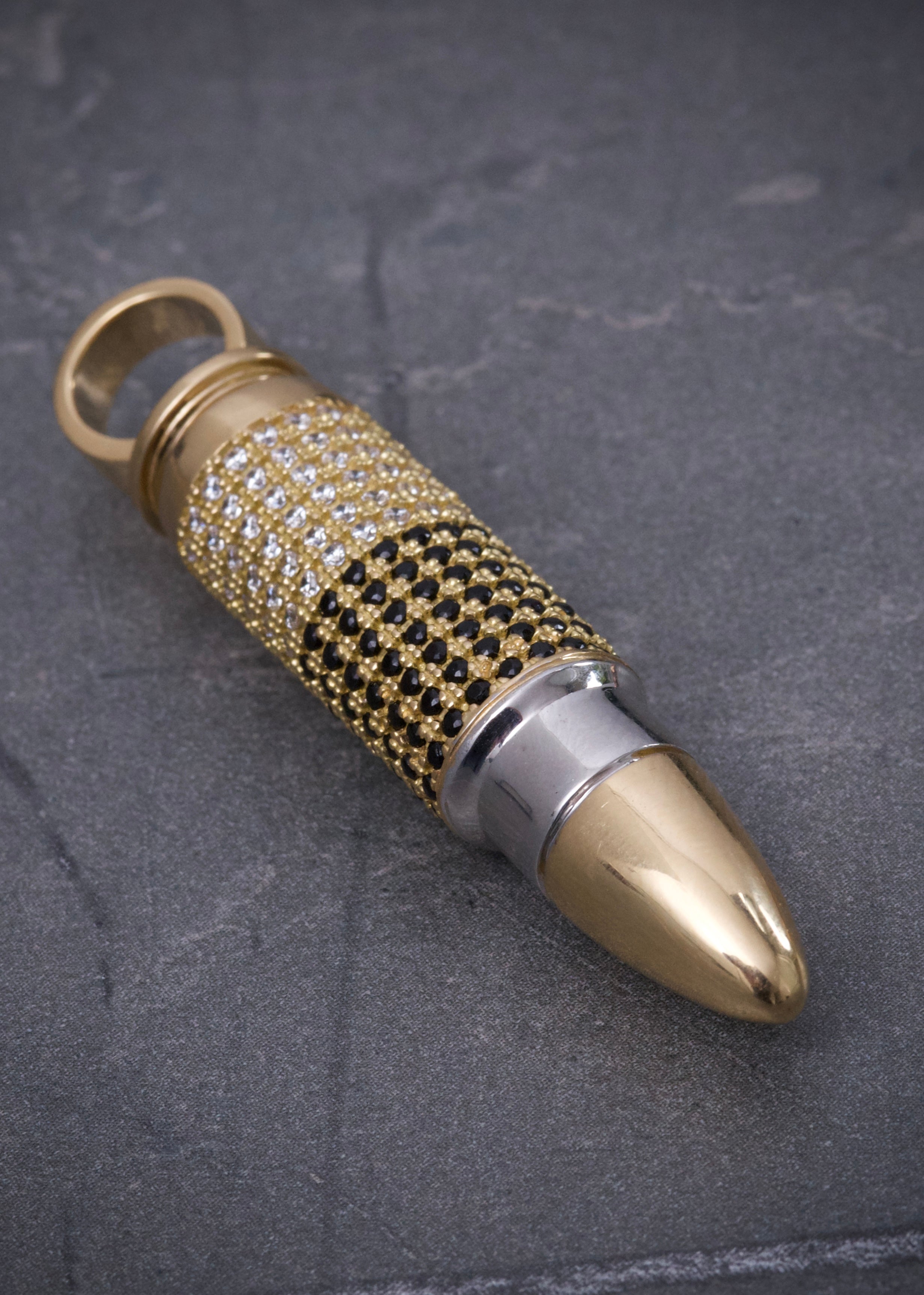 Dije bala con cuchara 16.8gr / Largo 5.3cm / Dos Oros Nac M