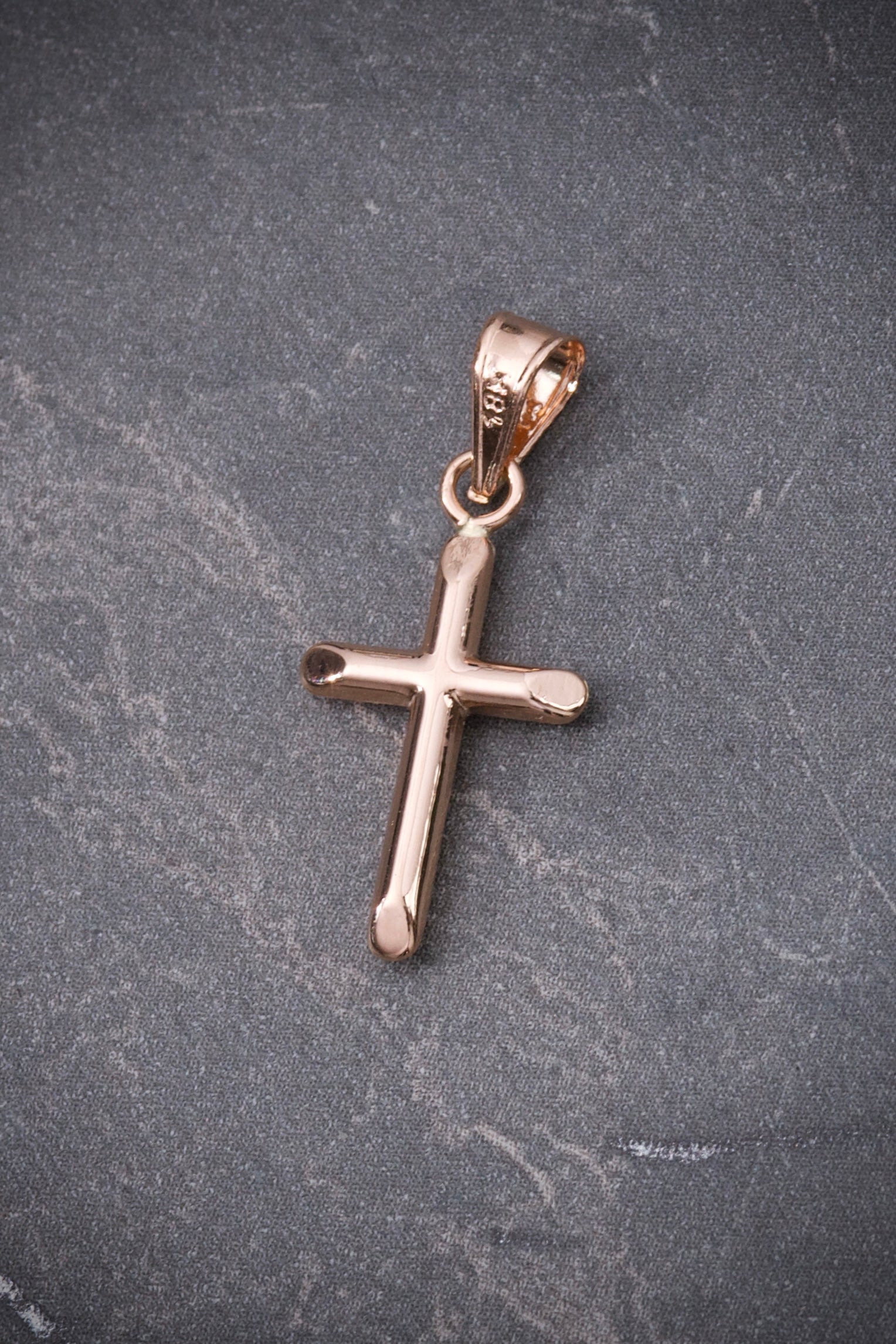 Dije de cruz lisa 0.55gr / 2.5cm / Oro Rosado Nac P