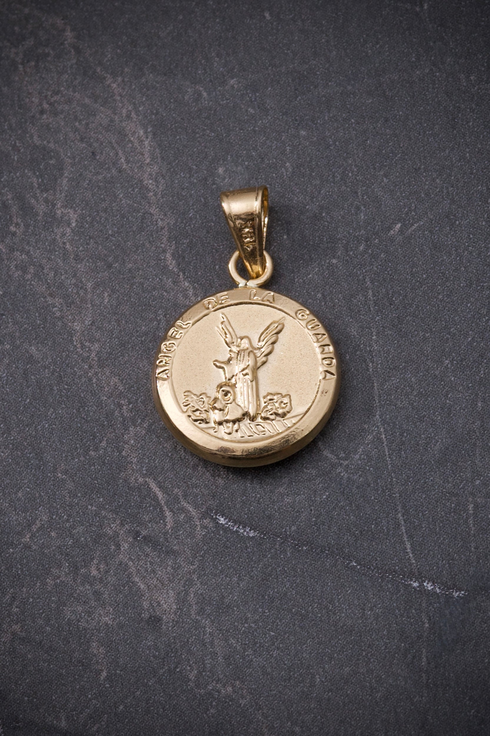 Dije angel de la guarda 0.7gr / Largo 2cm / Oro Amarillo Nac M