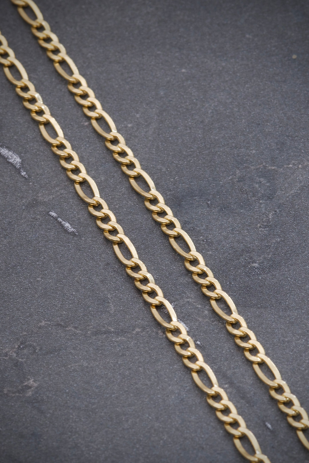 Cadena figaro 10.45gr / Largo 60 cm — Oro Amarillo