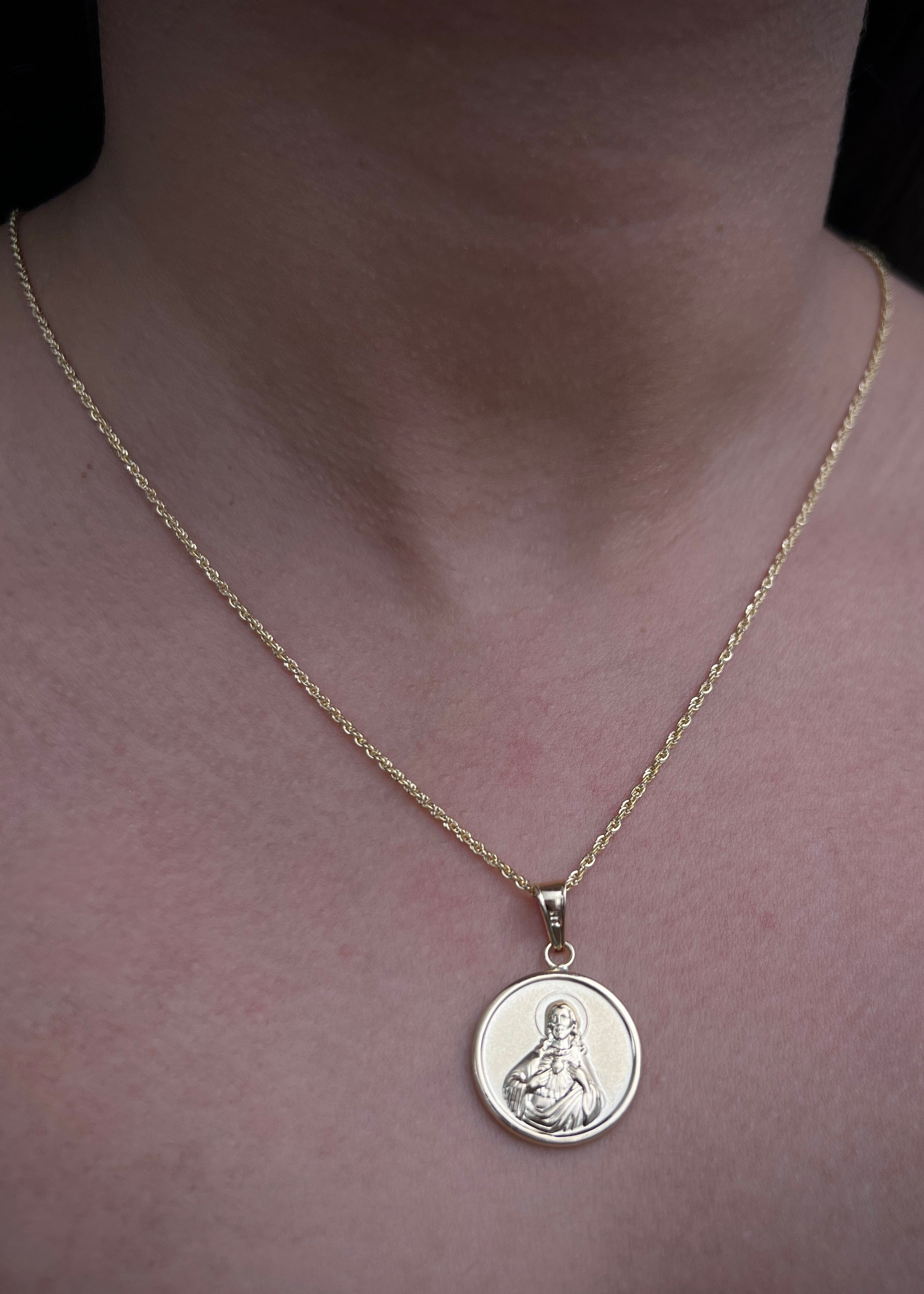 Dije corazon de jesus y virgen del carmen 2.2gr / Largo 3cm / Oro Amarillo Nac B