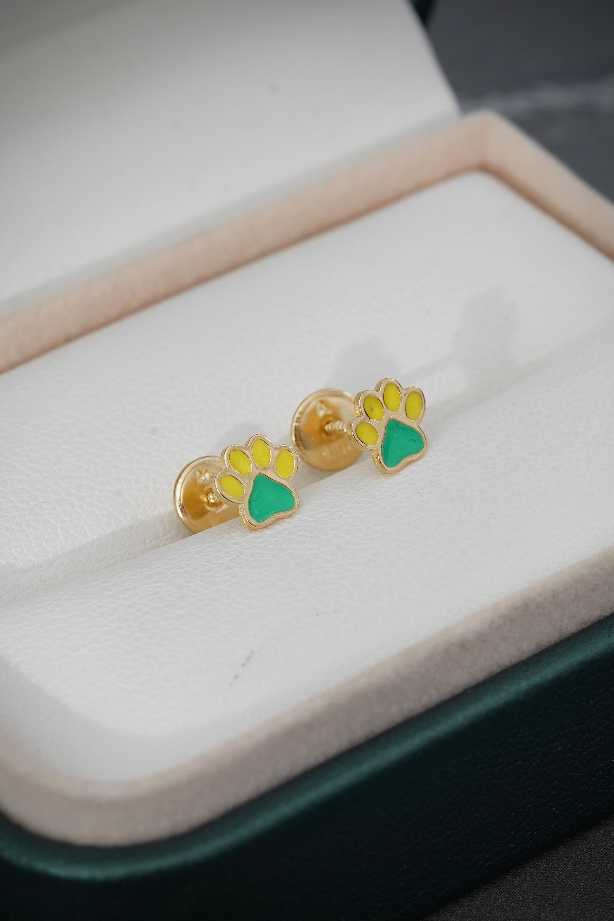 Topos huella de perro 0.8gr / Largo 0.2cm / Oro Amarillo Nac M