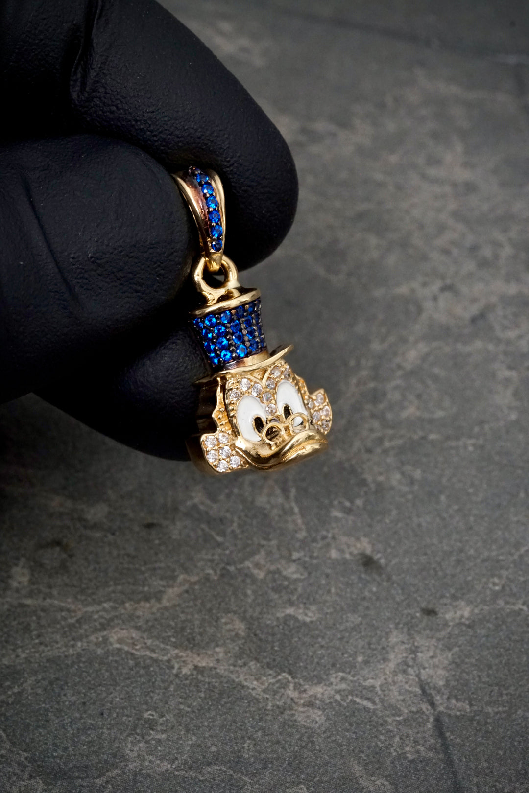 Dije tio rico con swarovski azul y blanco 5.05gr / Largo 2.5cm — Oro Amarillo