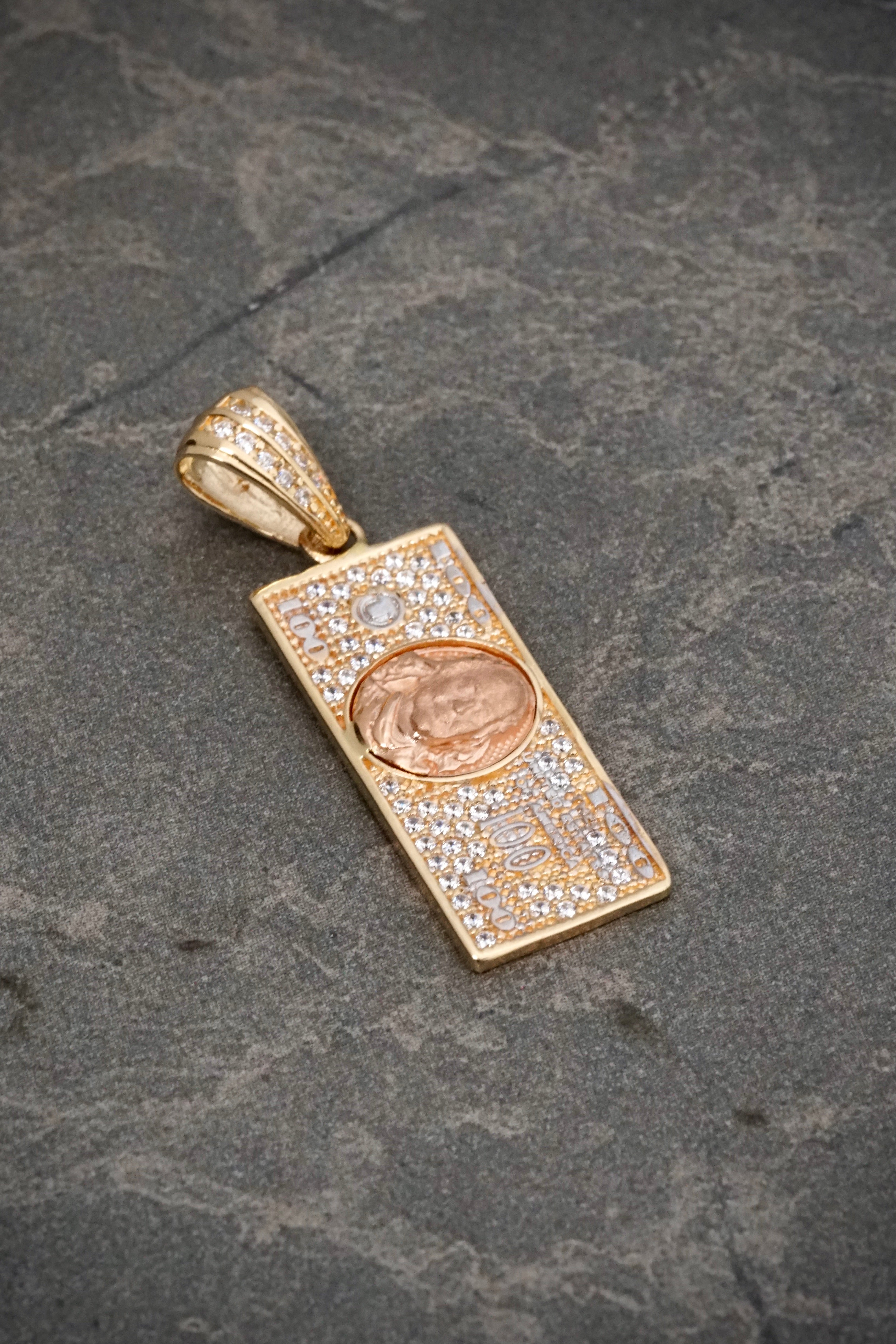 Dije dolar con swarovski blanco 3.45gr / Largo 3.4cm / Dos Oros Nac B