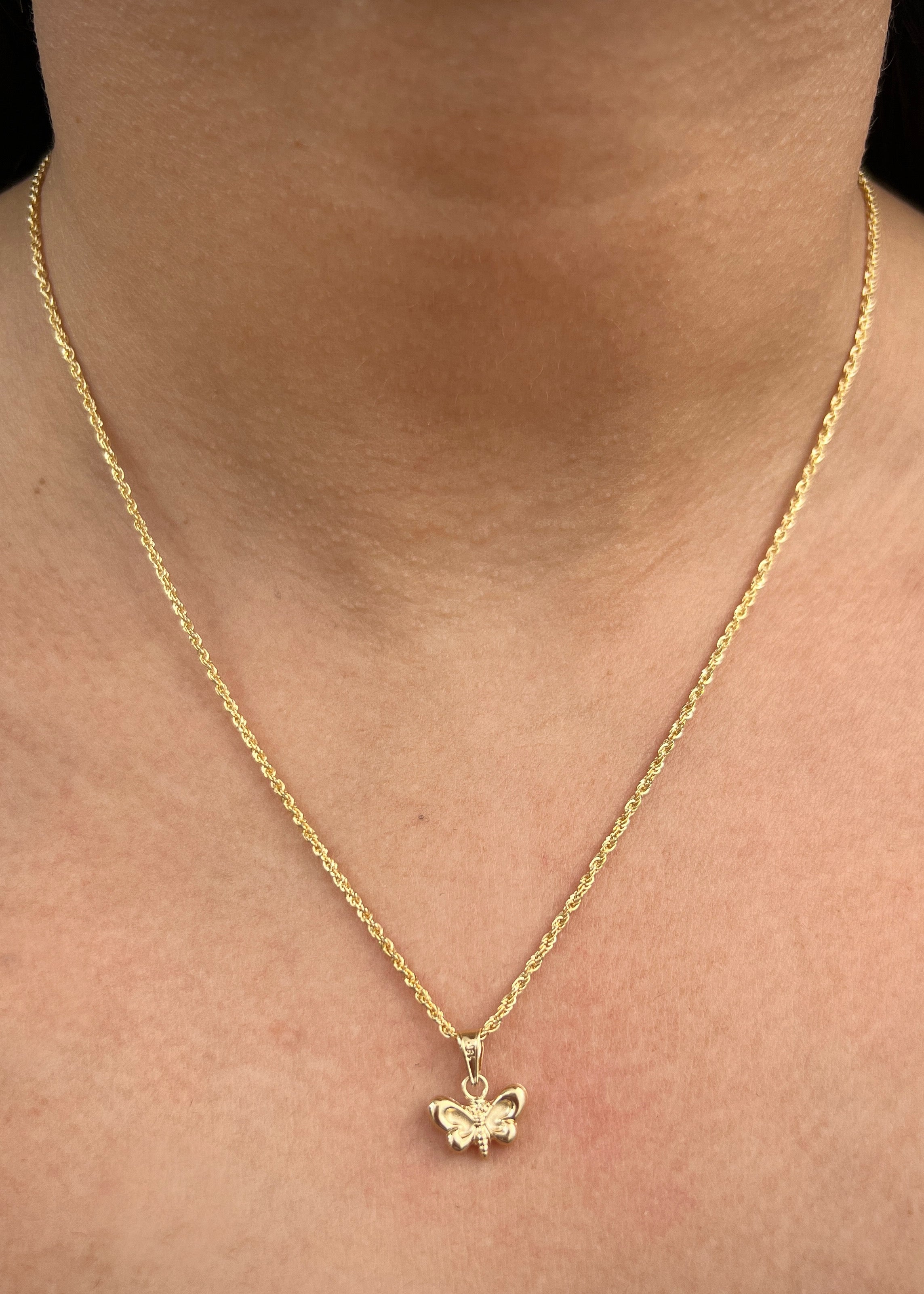 Dije mariposa 0.4gr / Largo 1.3cm / Oro Amarillo Nac M