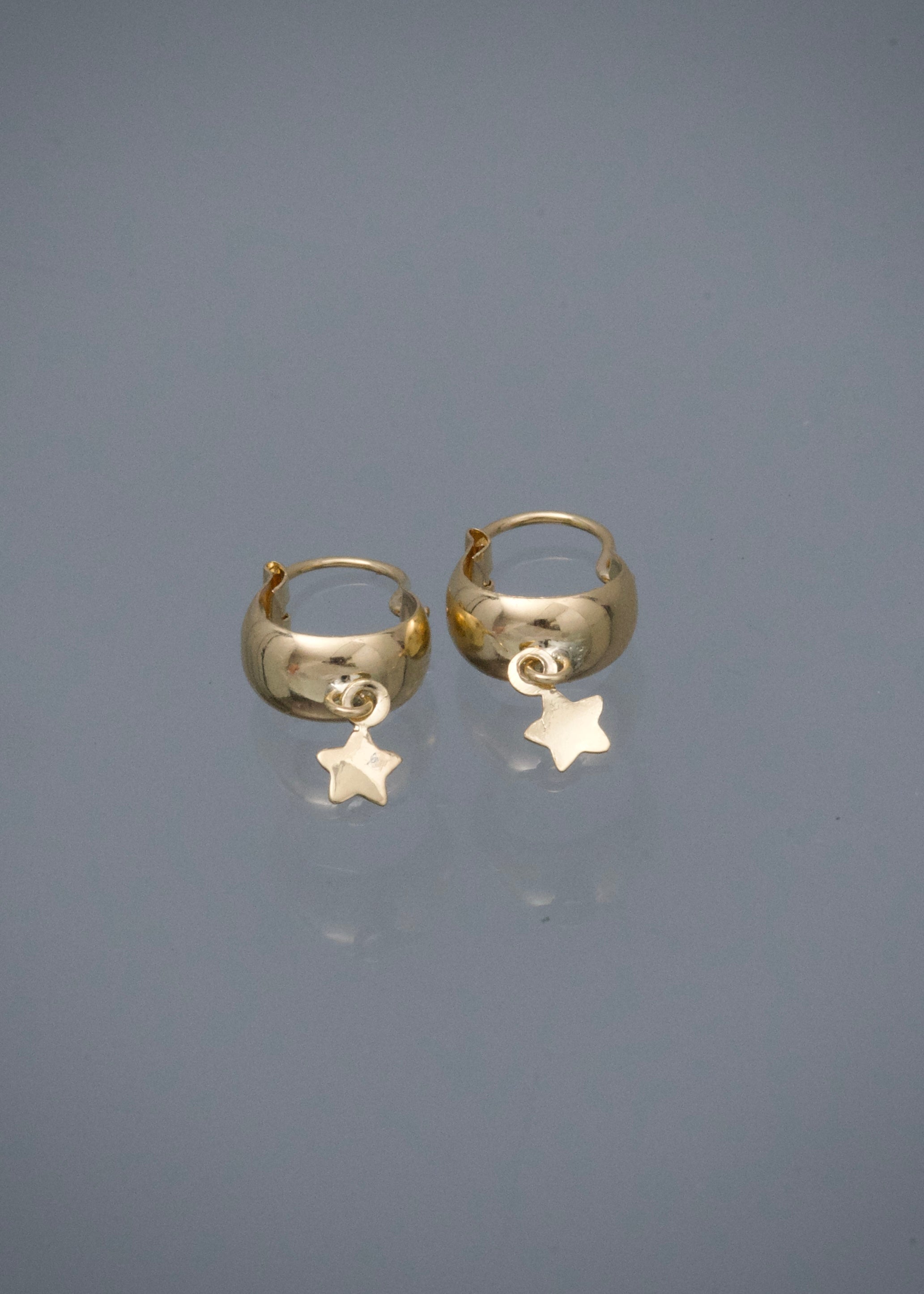 Candongas con Estrella 0.65gr / 1.8cm / 4.1mm — Oro Amarillo