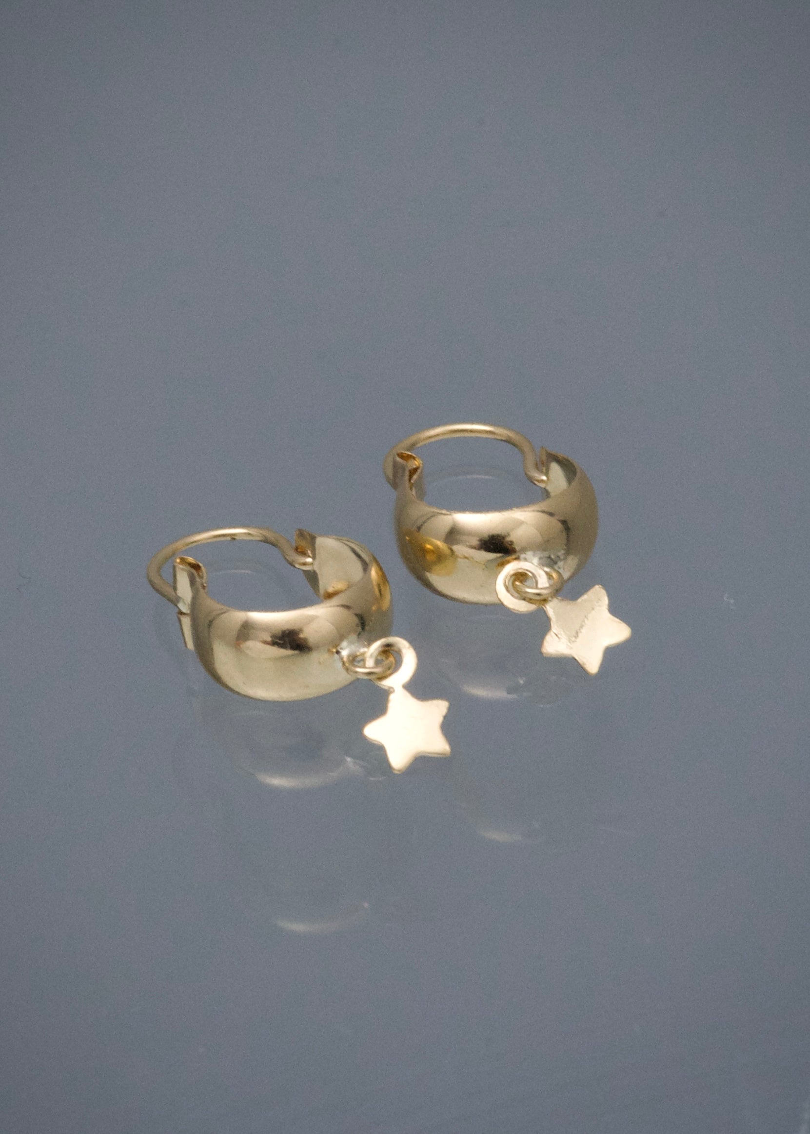 Candongas con Estrella 0.85gr / 2.2cm / 4.8mm — Oro Amarillo