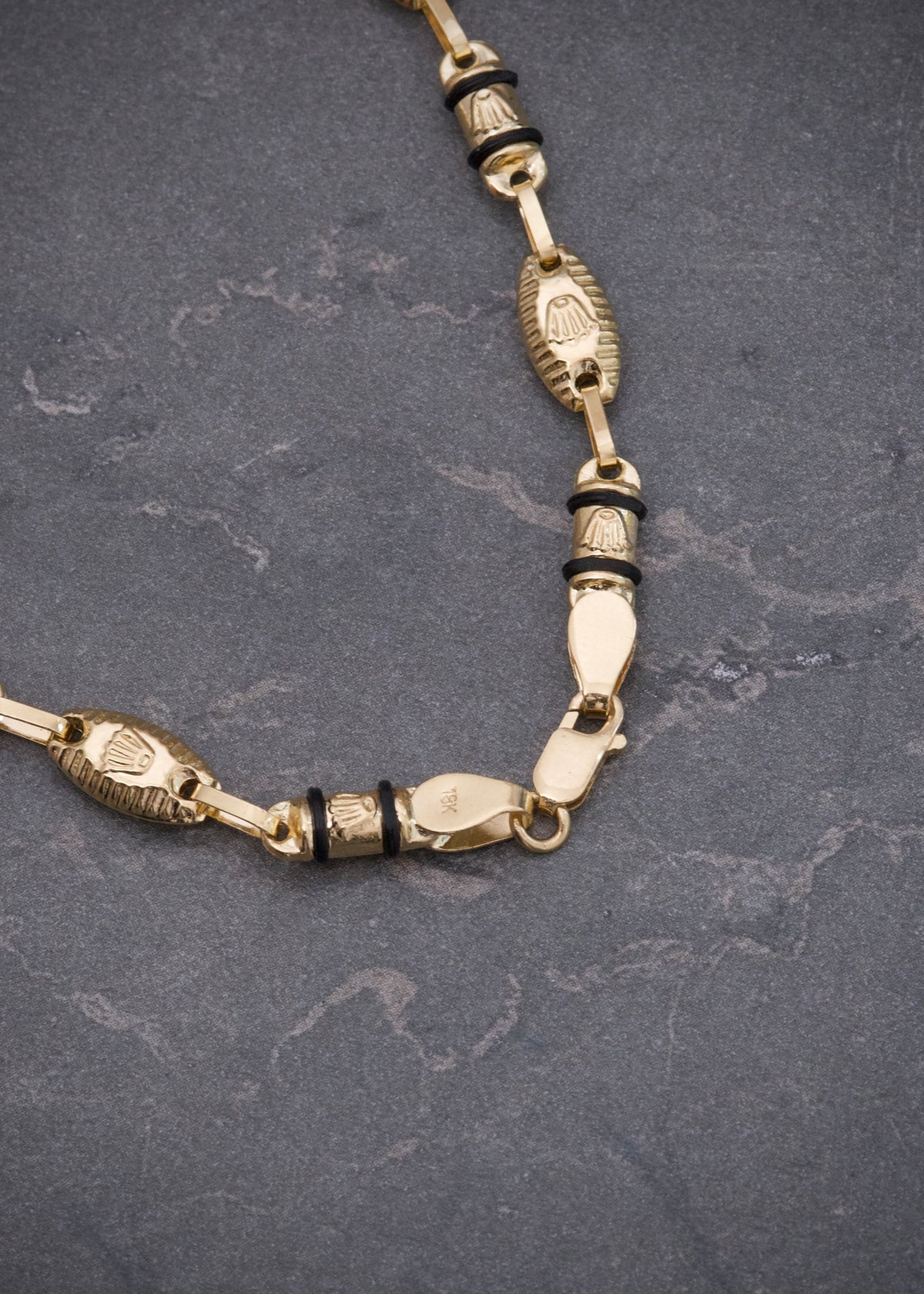 Cadena Rx con Cauchos Negros 15.3gr / 70cm / 5.5mm — Oro Amarillo