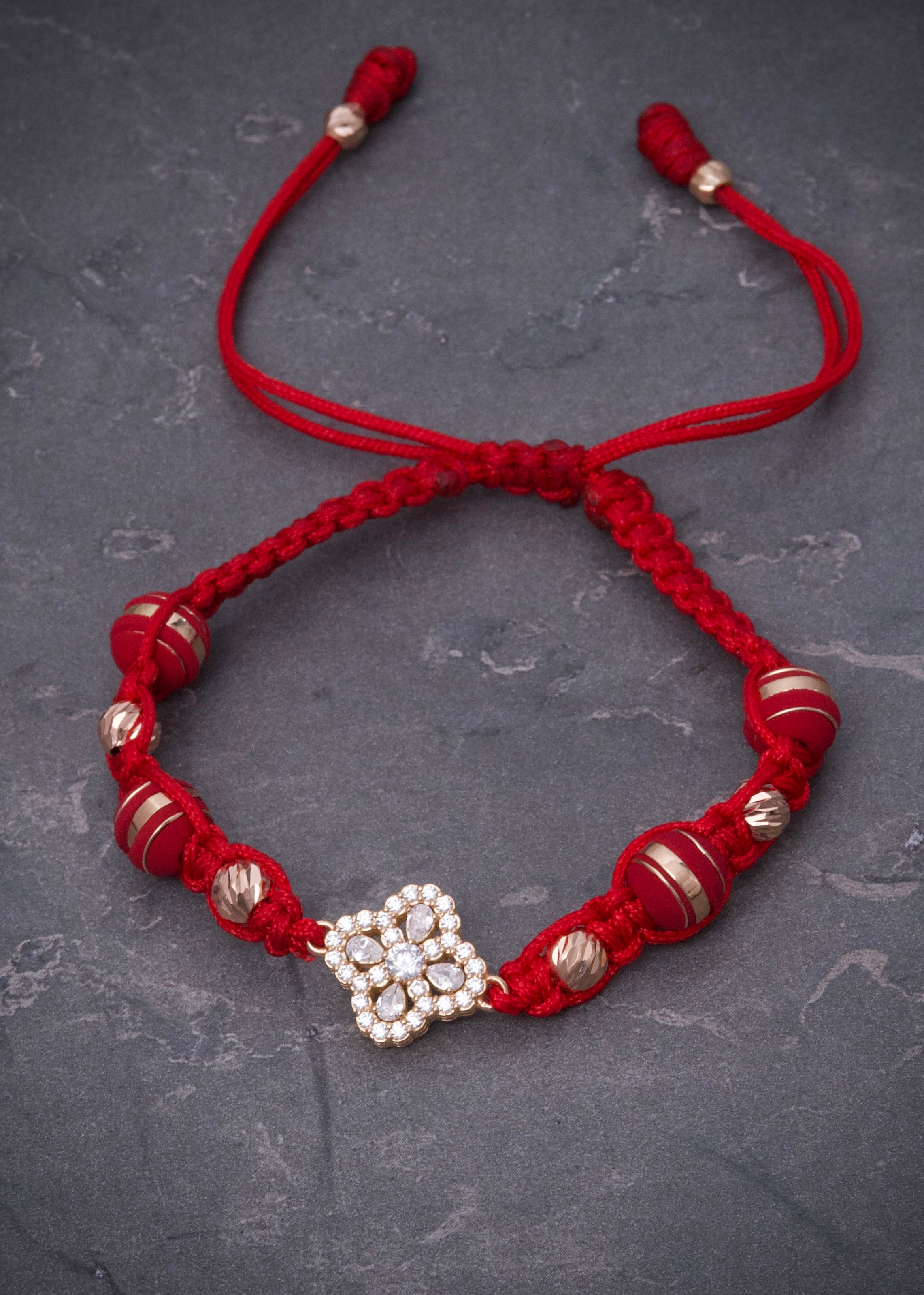 Pulsera en hilo rojo con herraje lucky clover 2.78gr / Oro Rosado (Joya) M