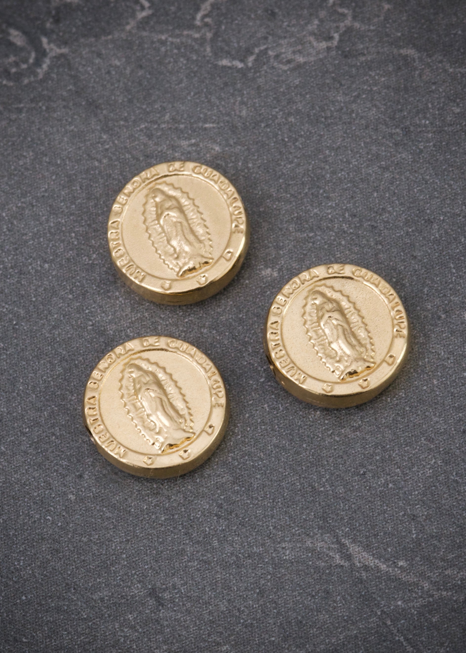 Herraje virgen de guadalepe 0.3gr / Largo 0.8cm / Oro Amarillo Nac B