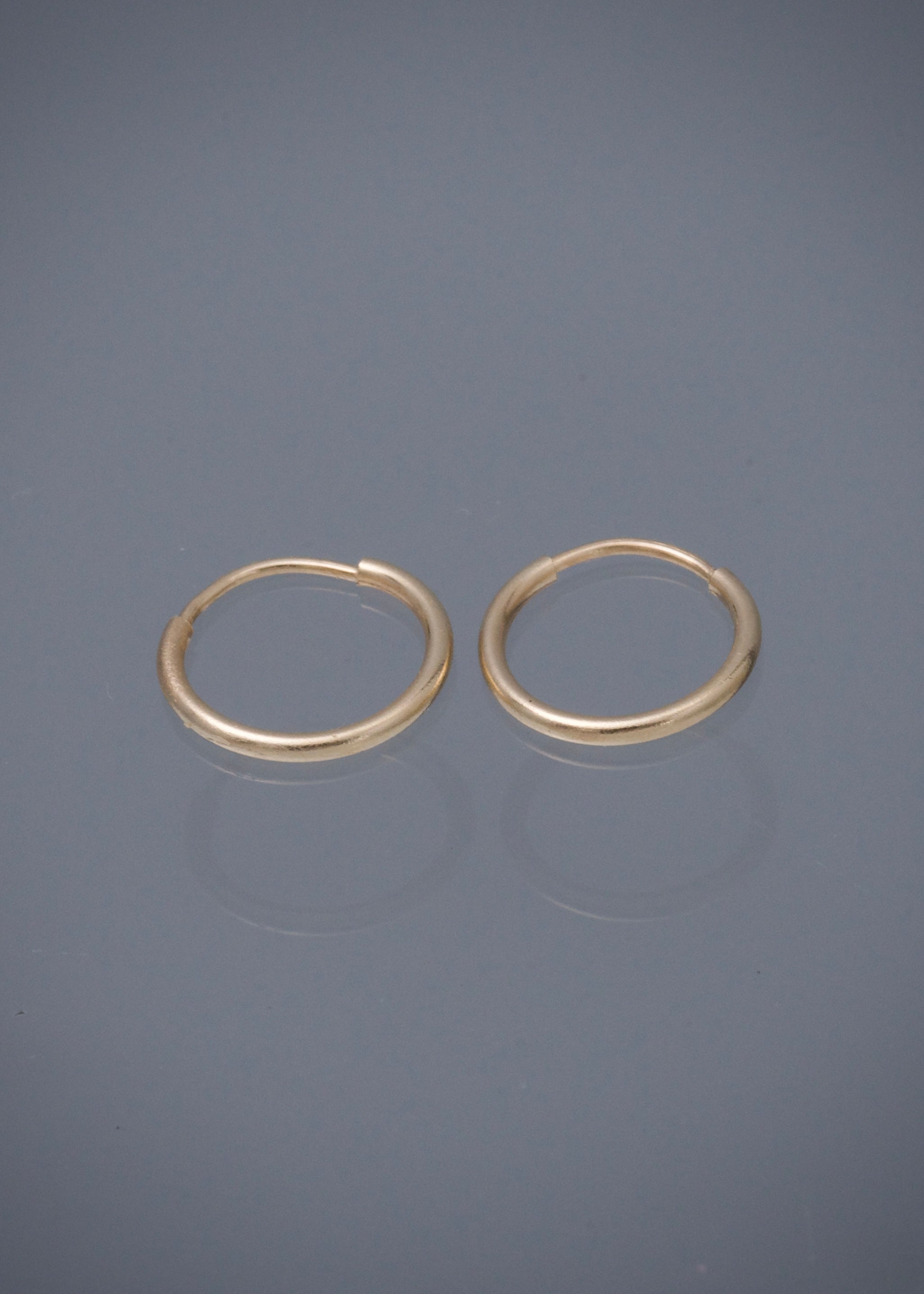 Candongas lisas 0.45gr / Largo 1.1cm / Oro Amarillo Nac*