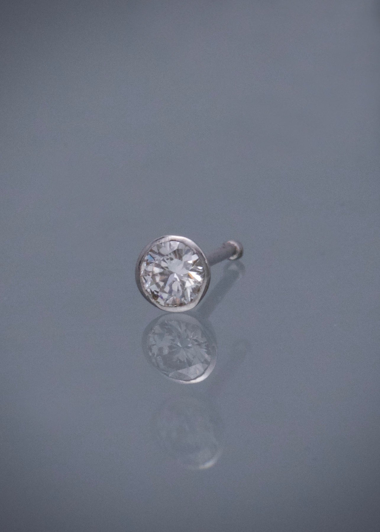Piercing con 9pts de diamante 0.15gr — Oro Blanco