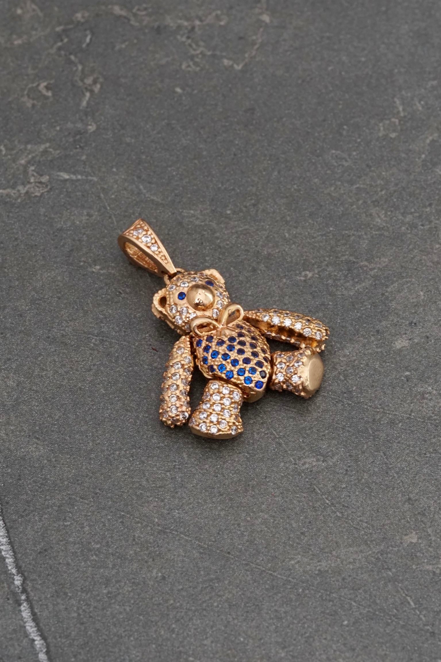 Dije articulado con swarovski azul y blanco 7.5gr / Largo 3cm / Oro Rosado Nac P