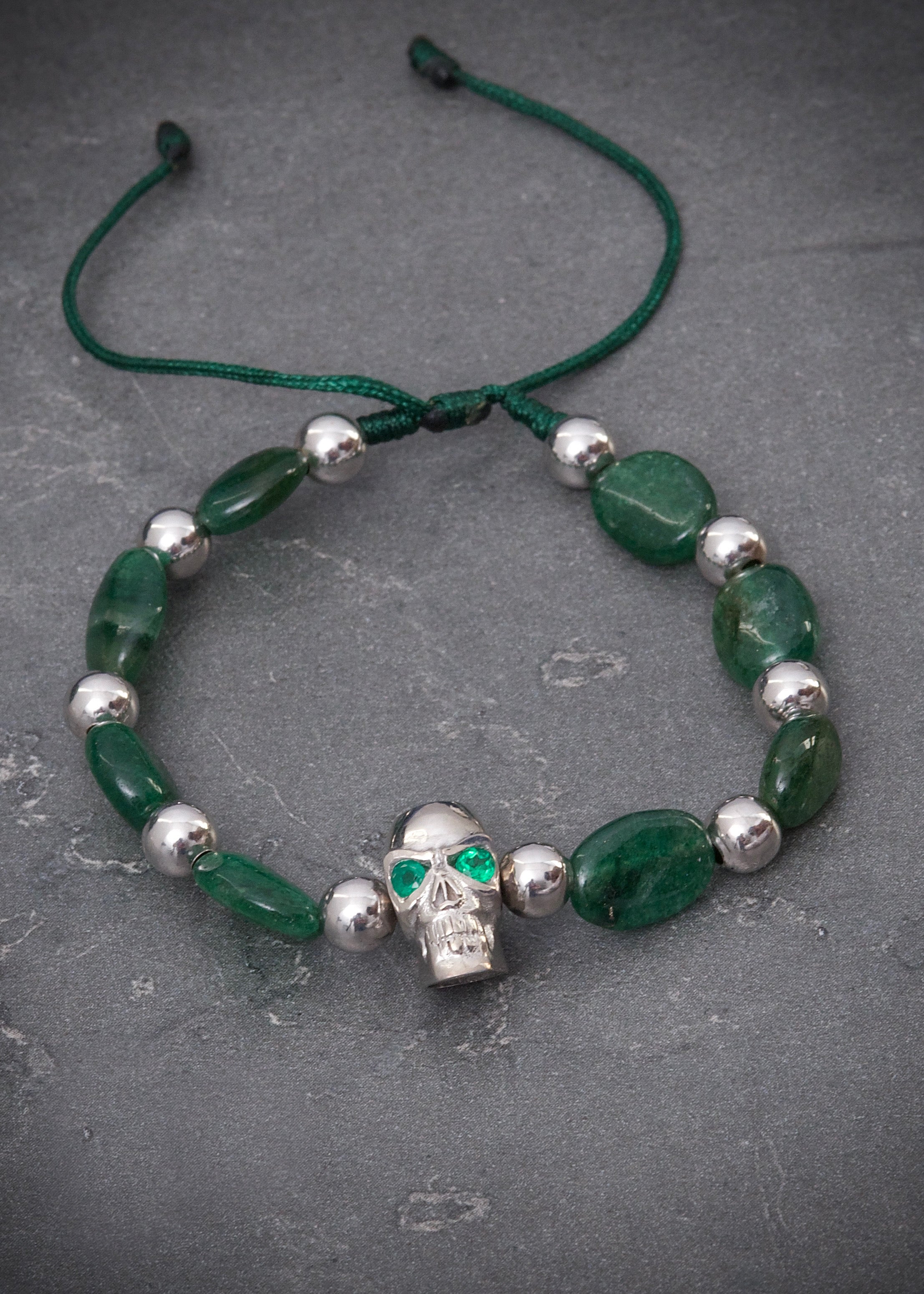 Pulsera en hilo verde con herraje calavera 4.9gr / Oro Blanco (Joya) M