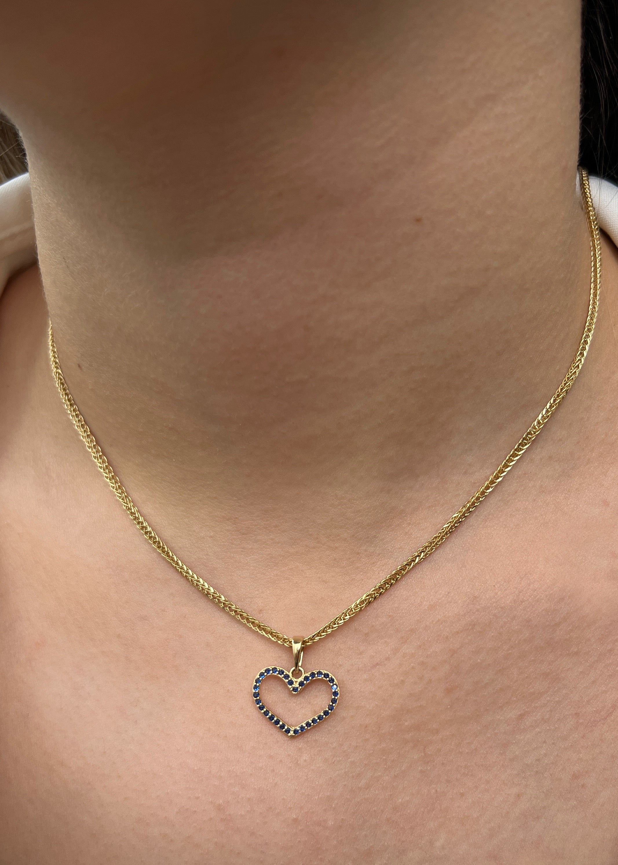 Dije corazon con swarovski azul 1.15gr / Largo 1.8cm / Oro Amarillo Nac M