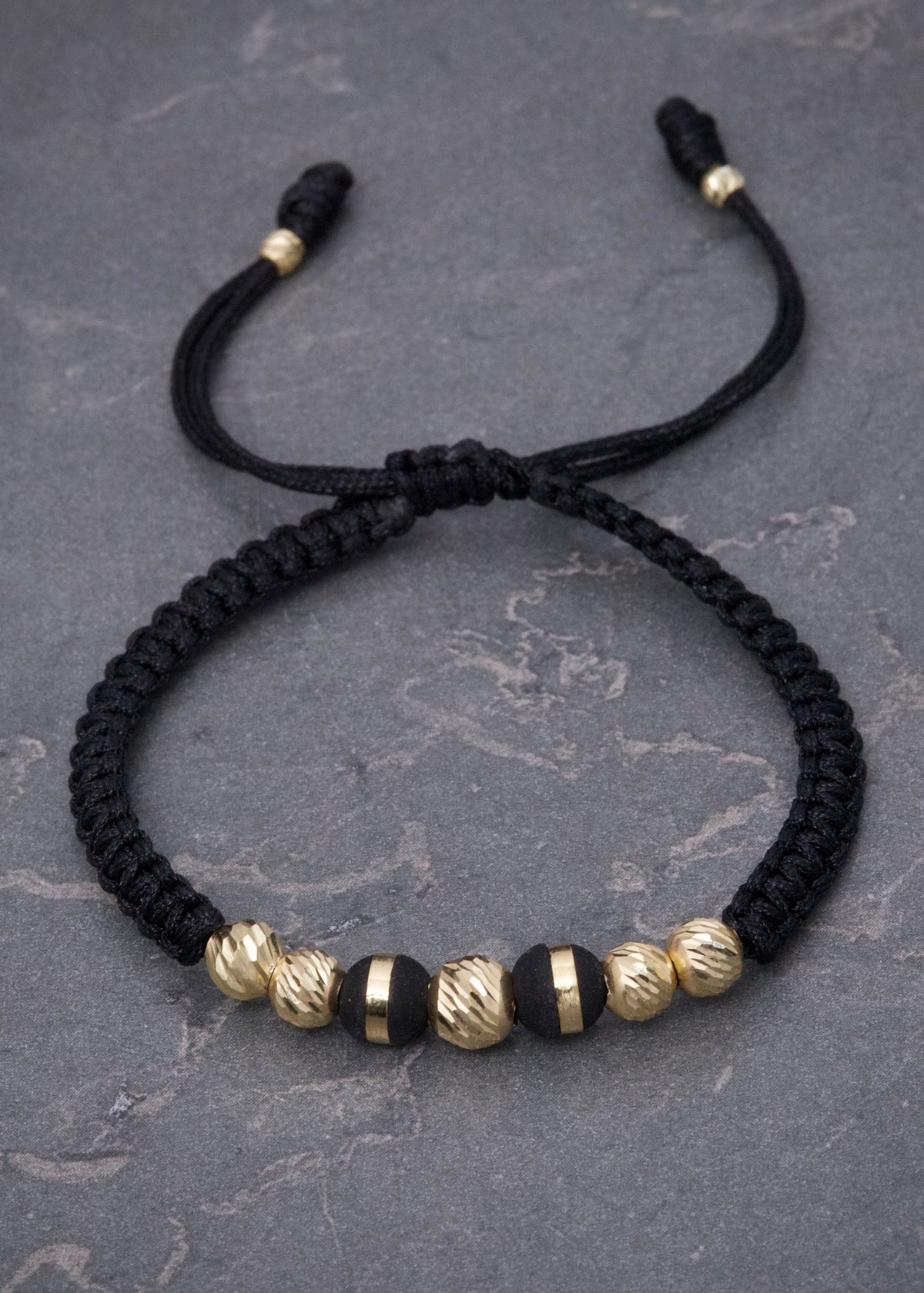 Pulsera en Hilo Negro con Bolas Diamantadas y Neoros 0.8gr — Oro Amarillo