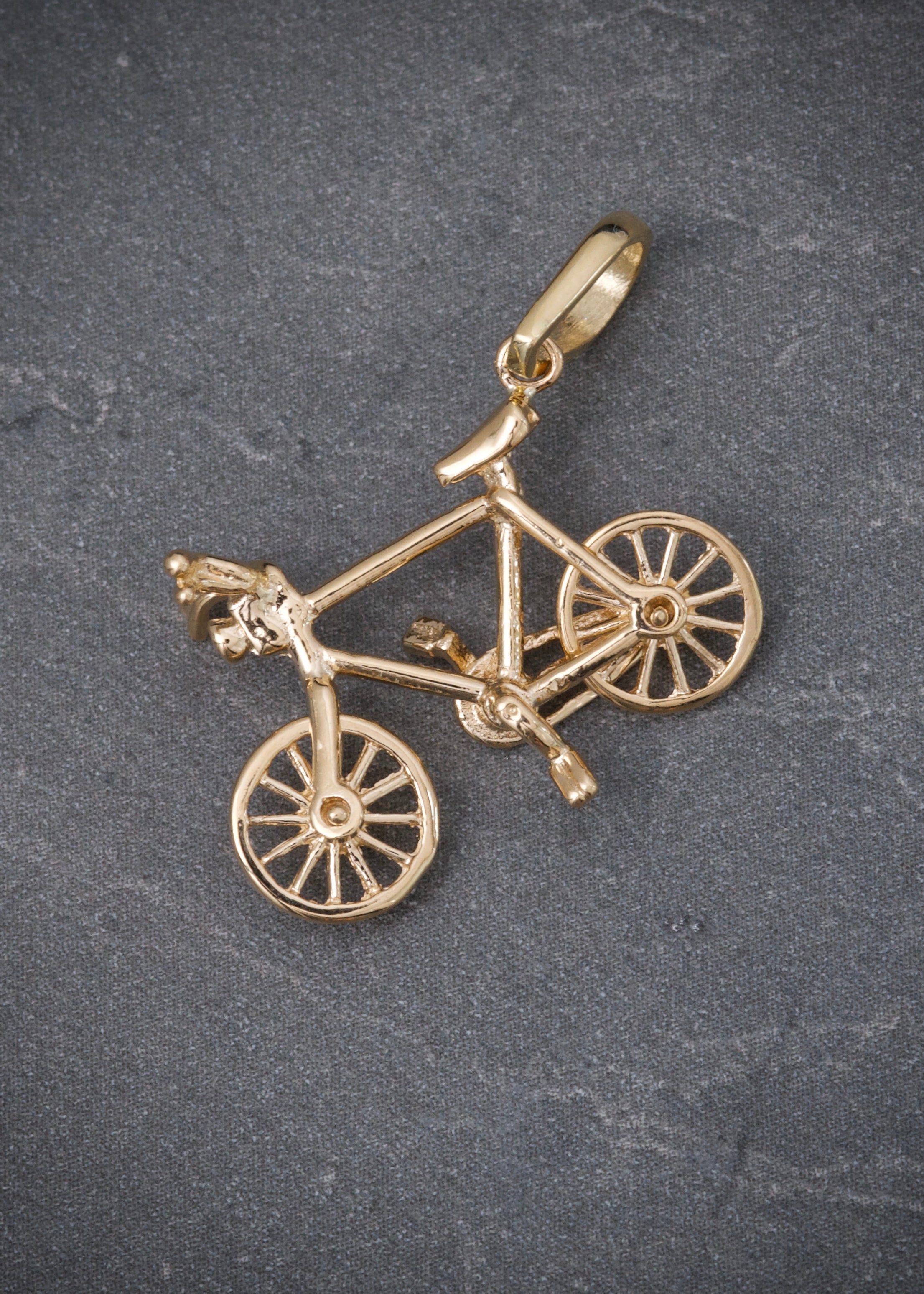 Dije bicicleta 2.25gr / Largo 2.7cm / Oro Amarillo Nac P