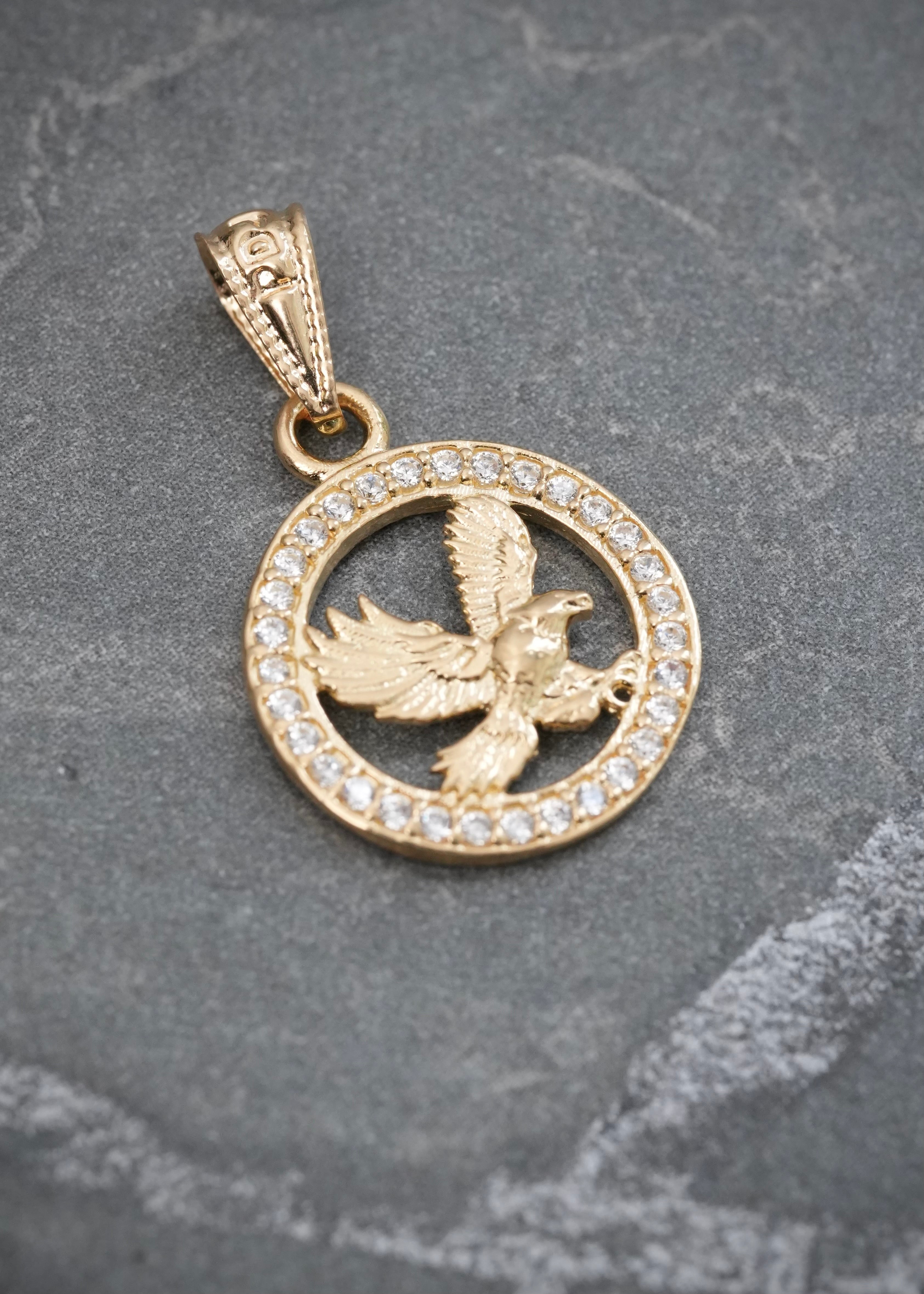Dije Aguila con Swarovski Blanco 1.3gr / 2.2cm / 13.4mm — Oro Amarillo