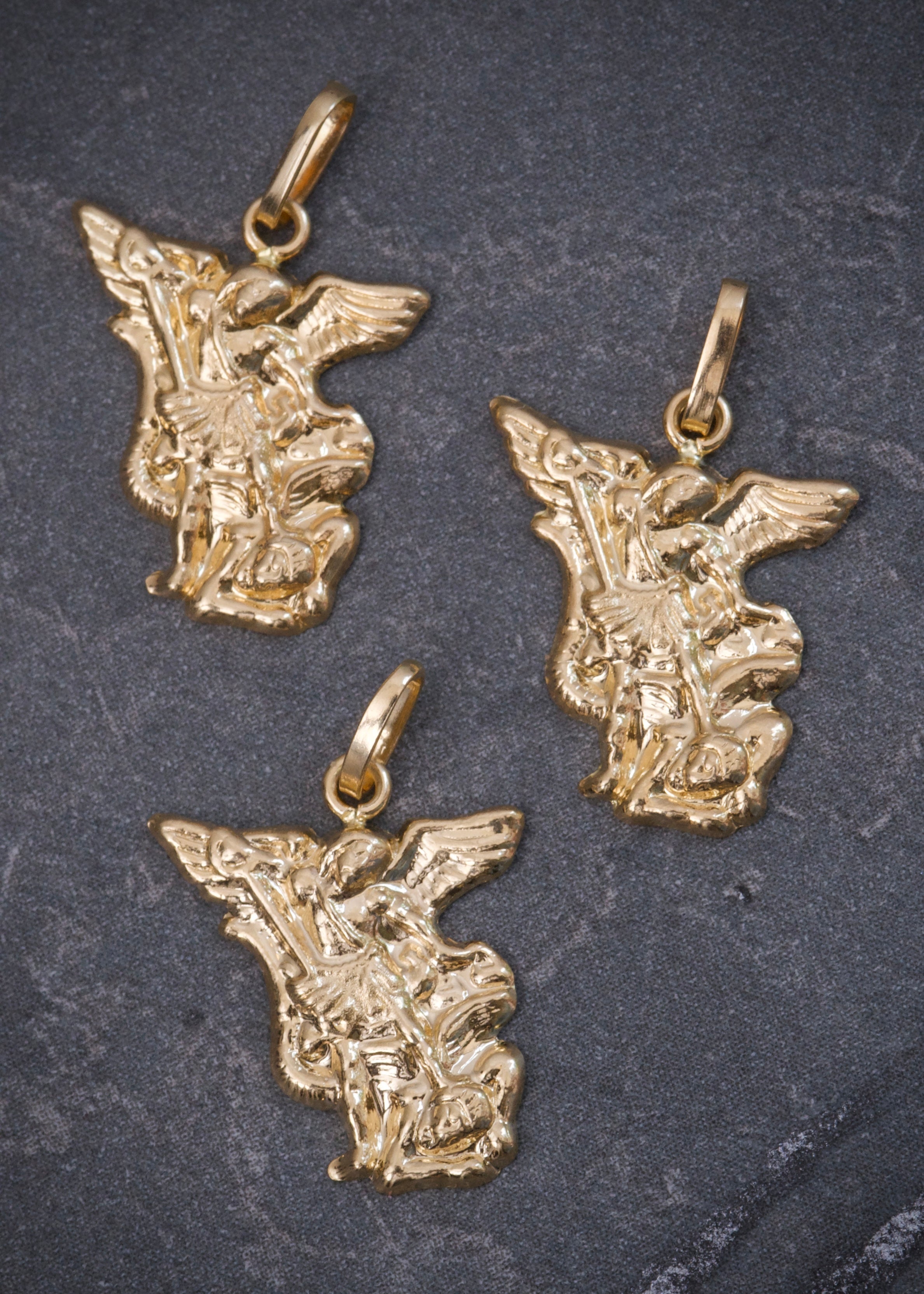 Dije arcangel san miguel 0.6gr / Largo 2cm / Oro Amarillo Nac B