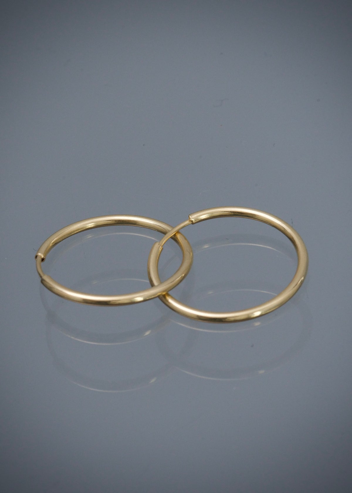 Candongas Lisas 0.7gr / 1.5cm / 1.1mm — Oro Amarillo